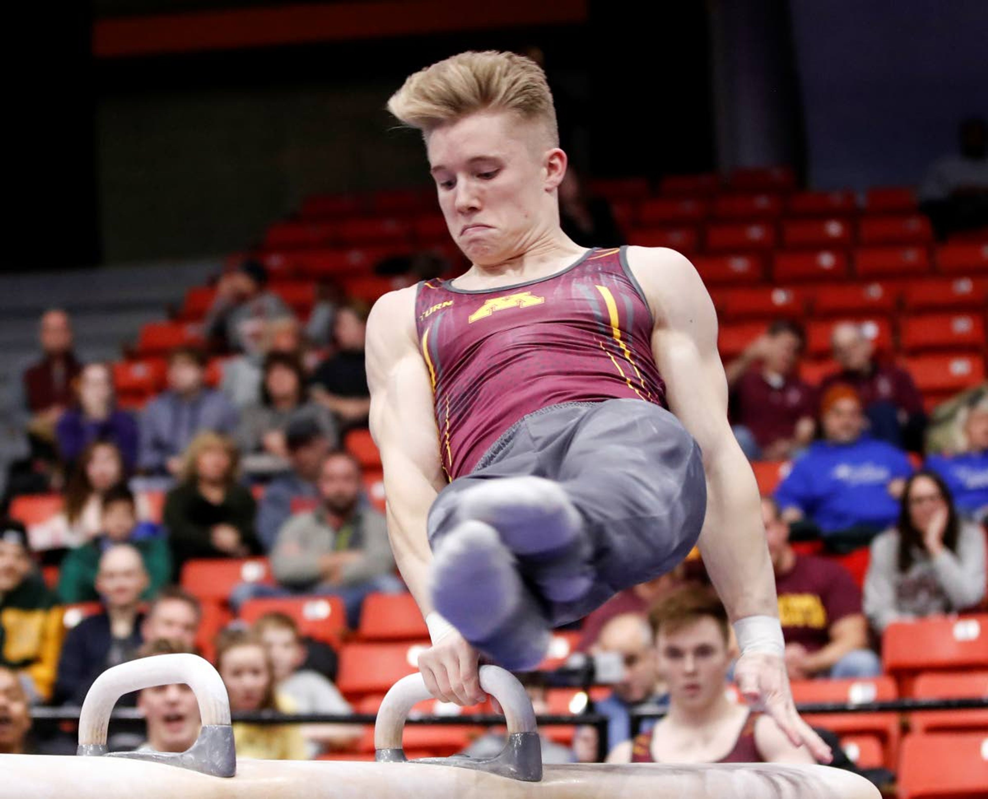 In this Jan. 18 photo, Minnesota’s Shane Wiskus competes during an NCAA gymnastics meet in Chicago. Wiskus is an Olympic hopeful who moved to the Olympic Training Center in Colorado Springs after his college program, Minnesota, announced it would be shutting down its program. Associated Press