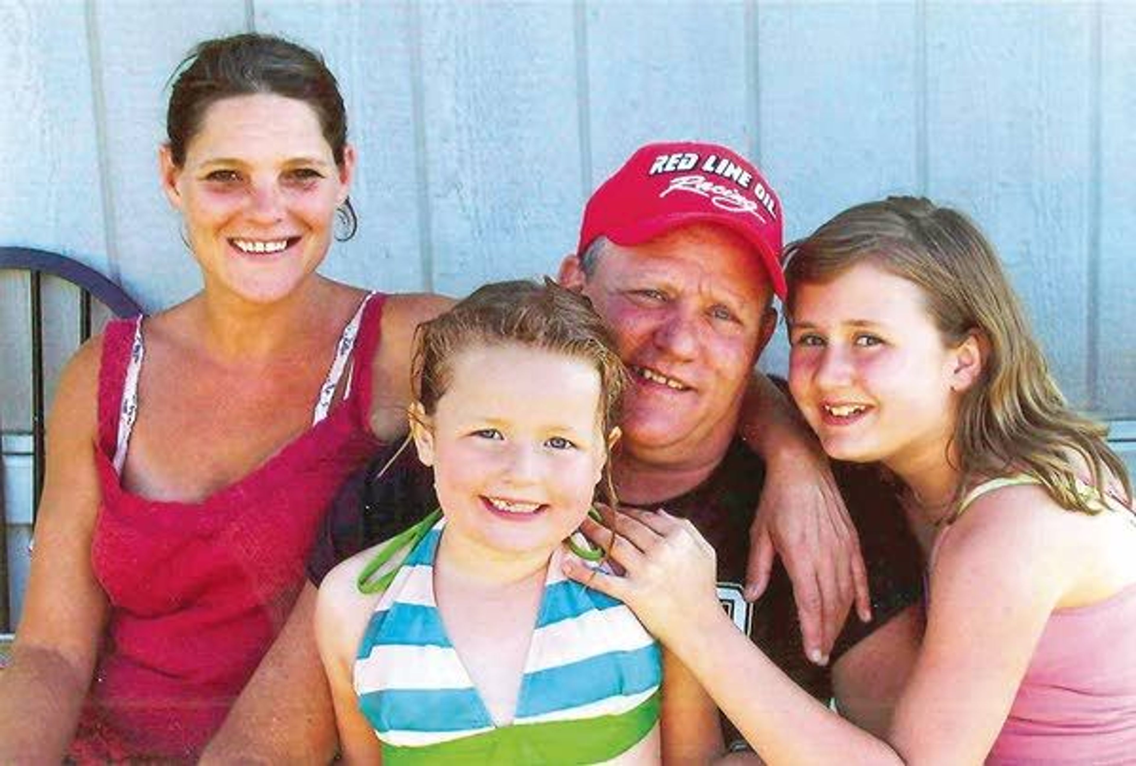 Belinda Niebuhr, left, is seen with her fiance, Don Fristoe, and his daughters, Raelynn Fristoe, right, and Annabelle.