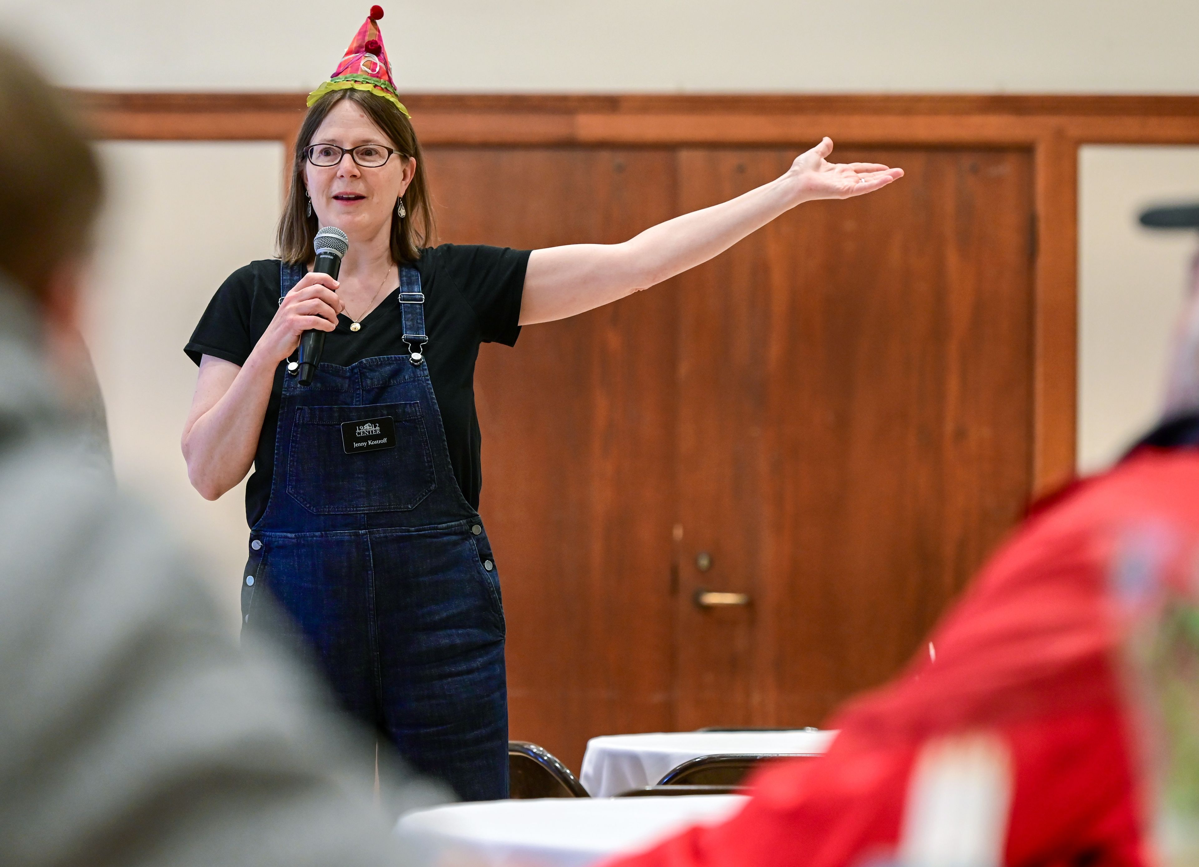 Heart of the Arts executive director Jenny Kostroff, wearing a hat to celebrate her birthday, speaks at a community brainstorming and design meeting for the 1912 Center’s third floor in Moscow on Tuesday.