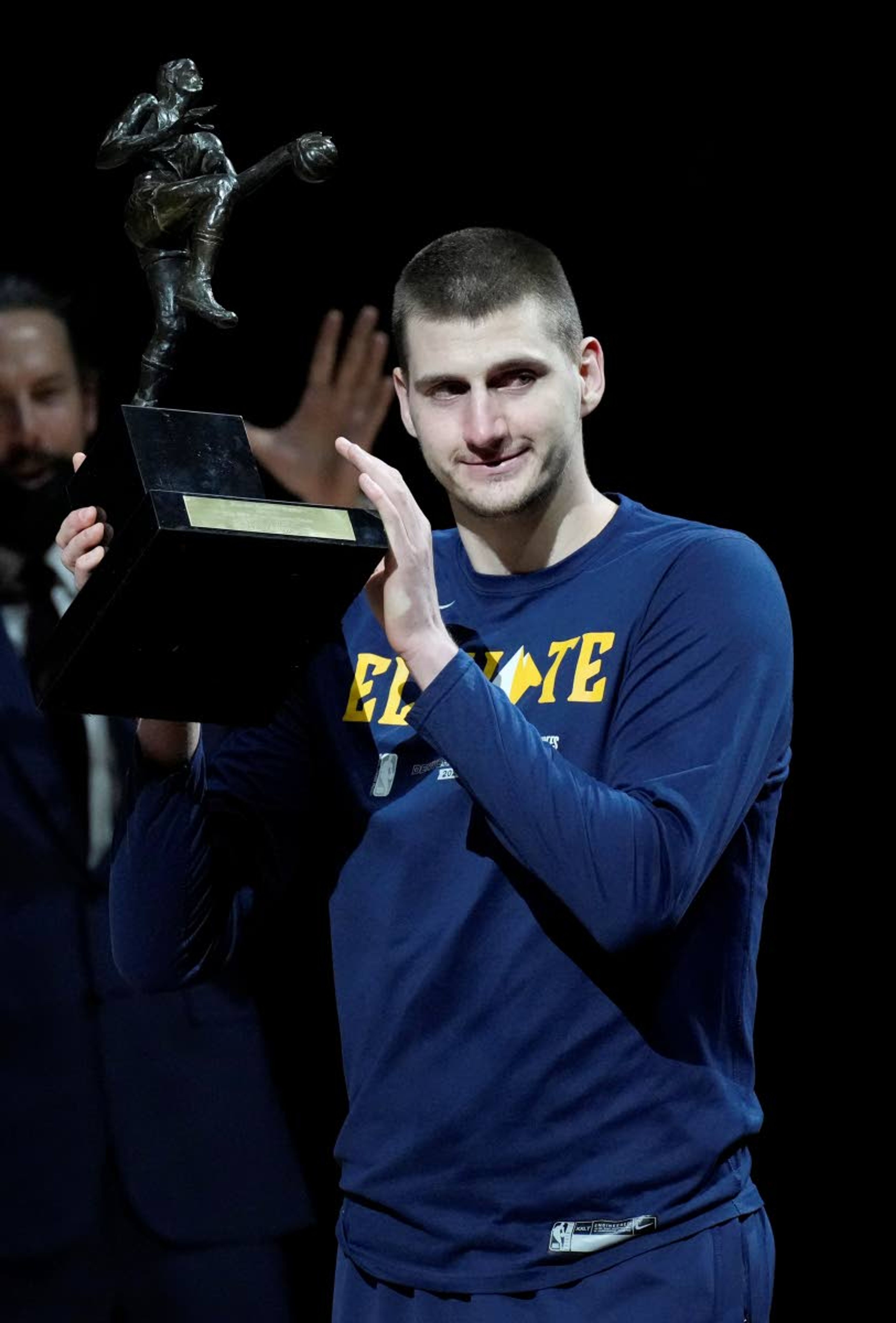 Denver Nuggets center Nikola Jokic accepts the Most Valuable Player award before Game 3 of an NBA second-round playoff series against the Phoenix Suns, Friday, June 11, 2021, in Denver. (AP Photo/David Zalubowski)