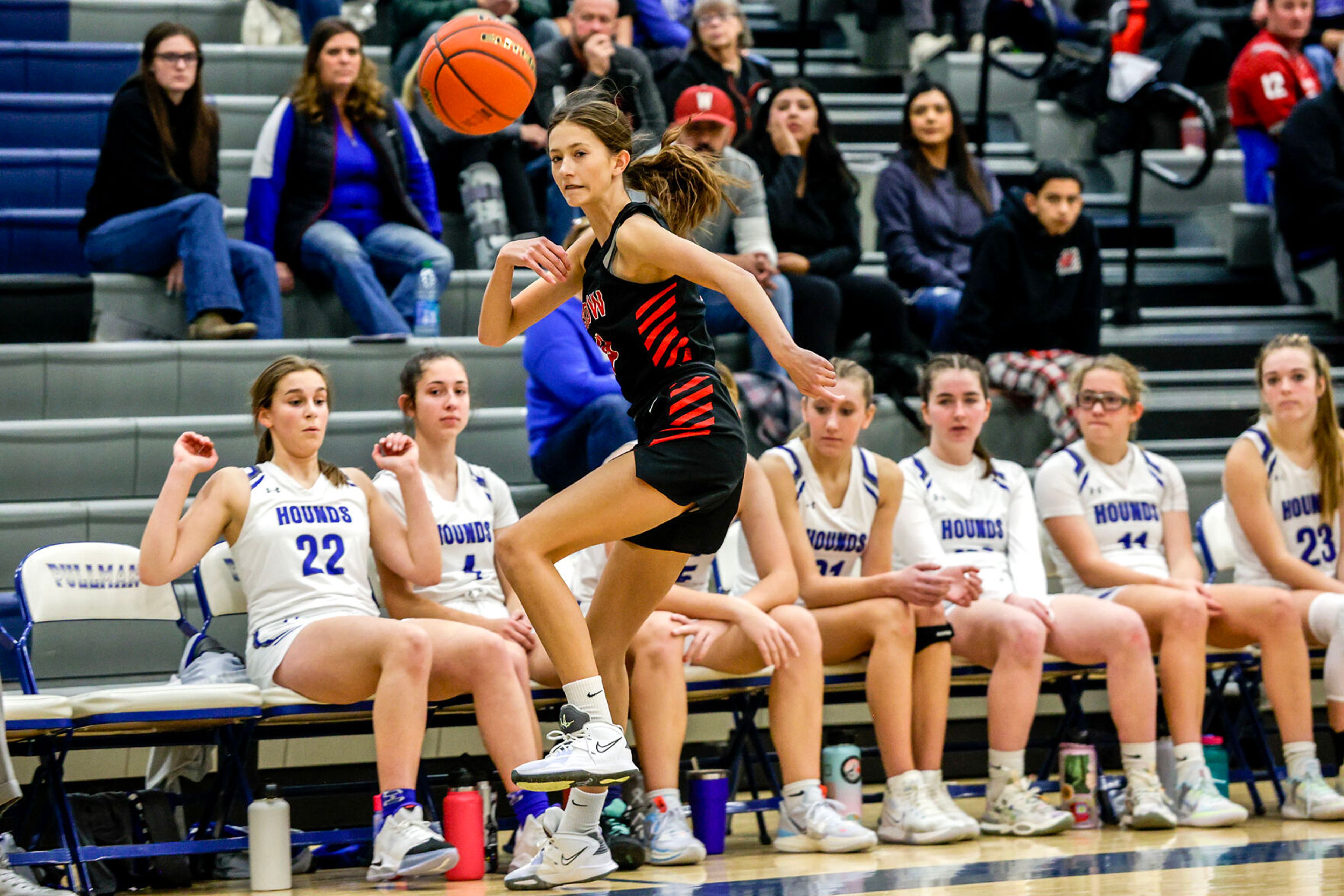 Moscow guard Taylor McLuen keeps the ball in bounds during Saturday's nonleague girls basketball game at Pullman.