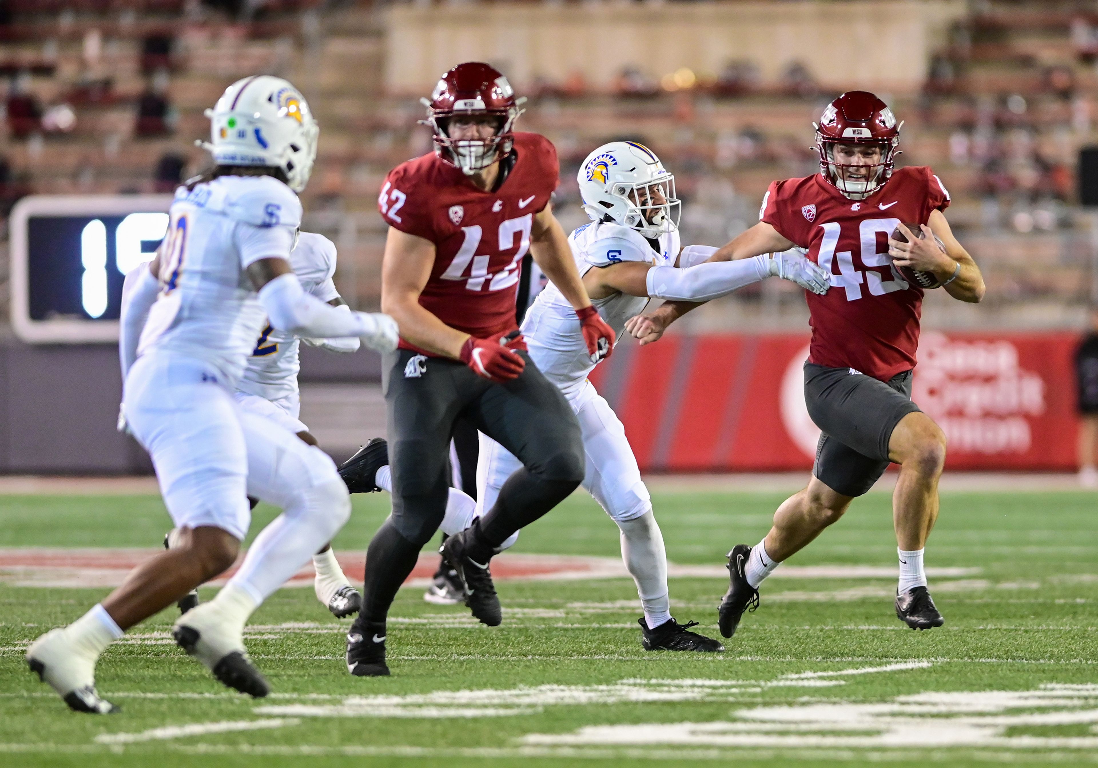 Washington State kicker Dean Janikowski runs with the ball in a trick play against San Jose State on Sept. 20 in Pullman.