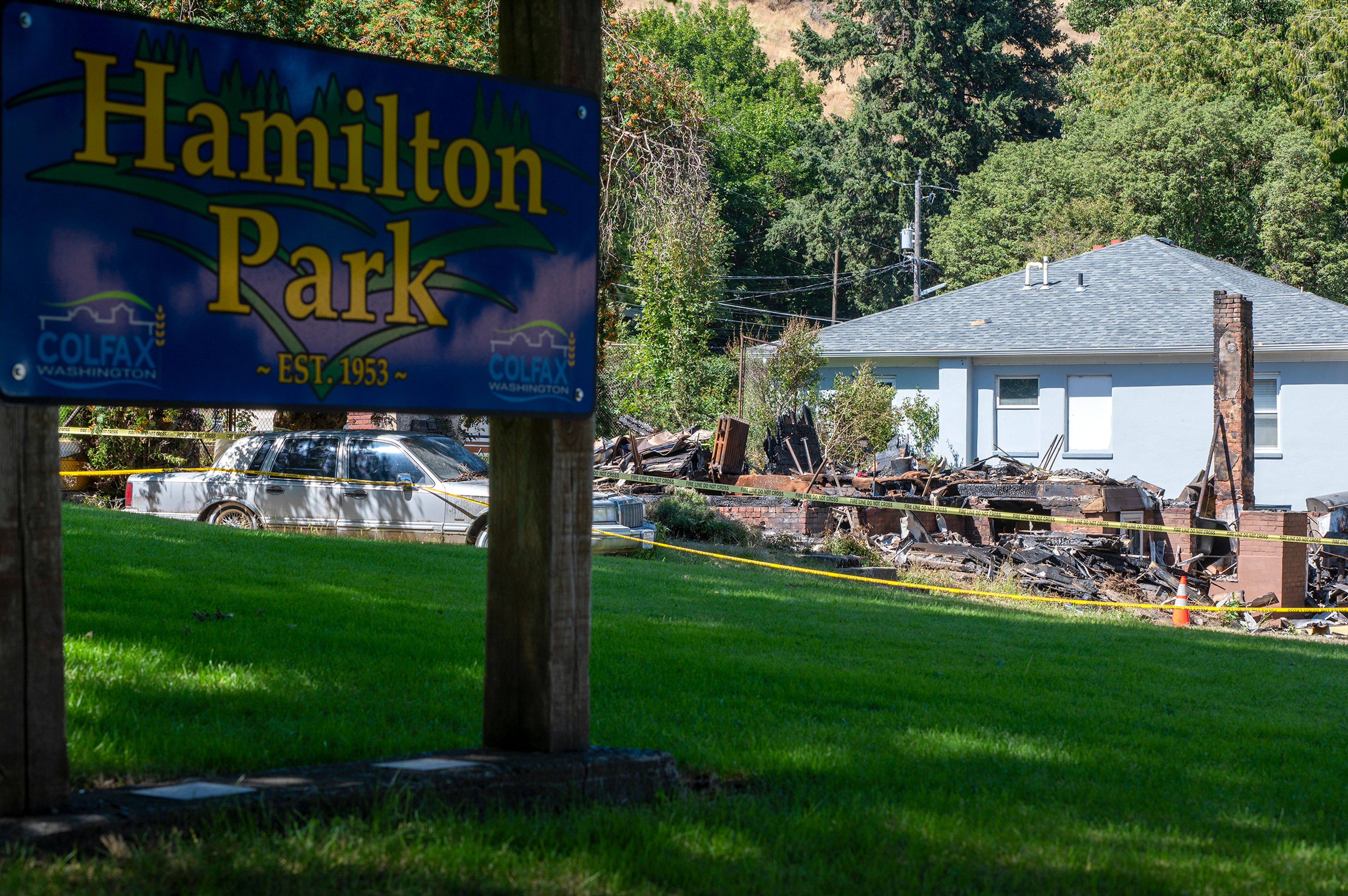 The aftermath of a house fire on the 200 block of Thorn Street in Colfax is seen Monday. Hamilton Park is directly across the street from the burned structure.