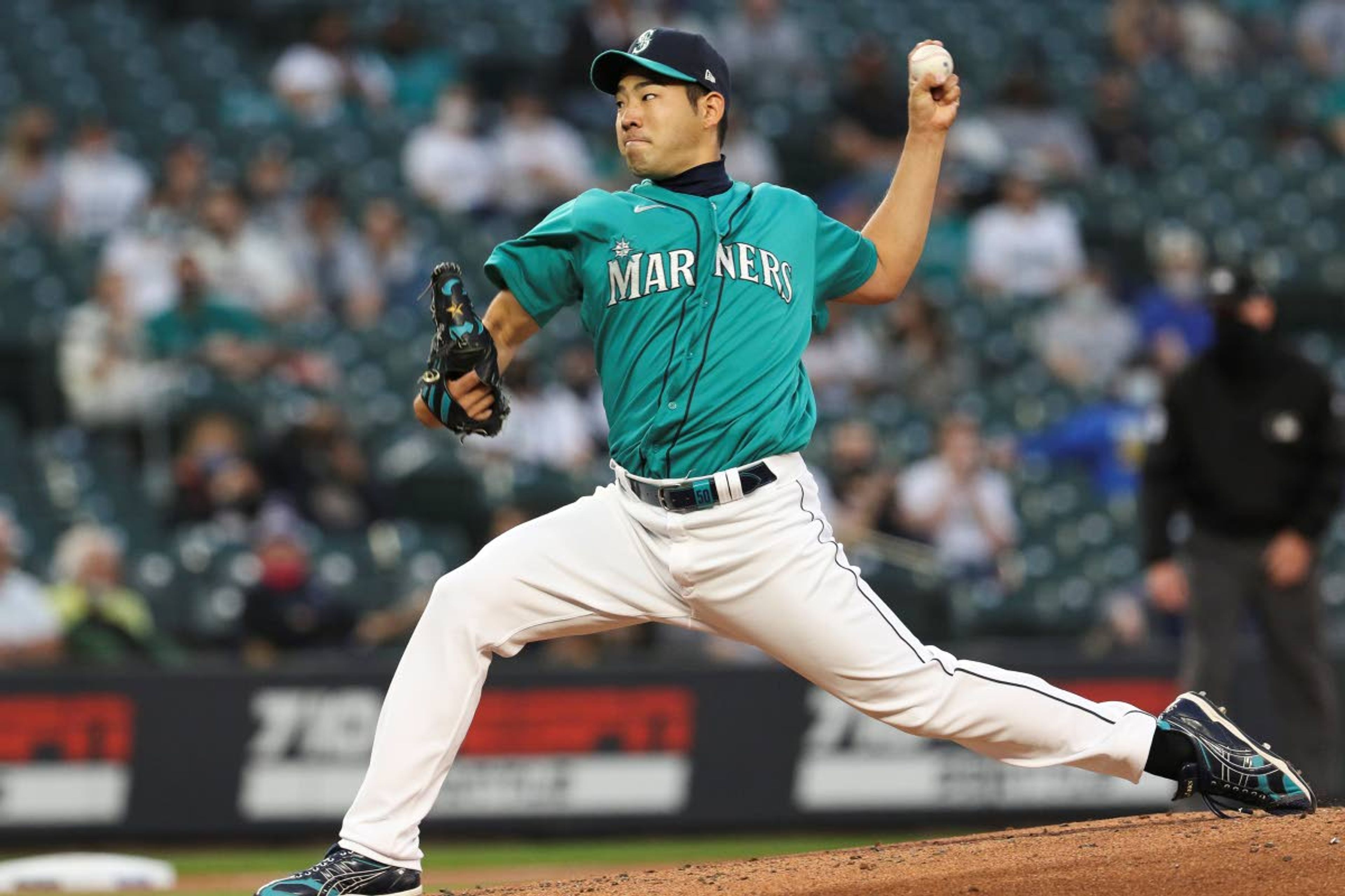 Seattle Mariners starting pitcher Yusei Kikuchi throws to a Houston Astros batter during the third inning of a baseball game Friday, April 16, 2021, in Seattle (AP Photo/Jason Redmond)