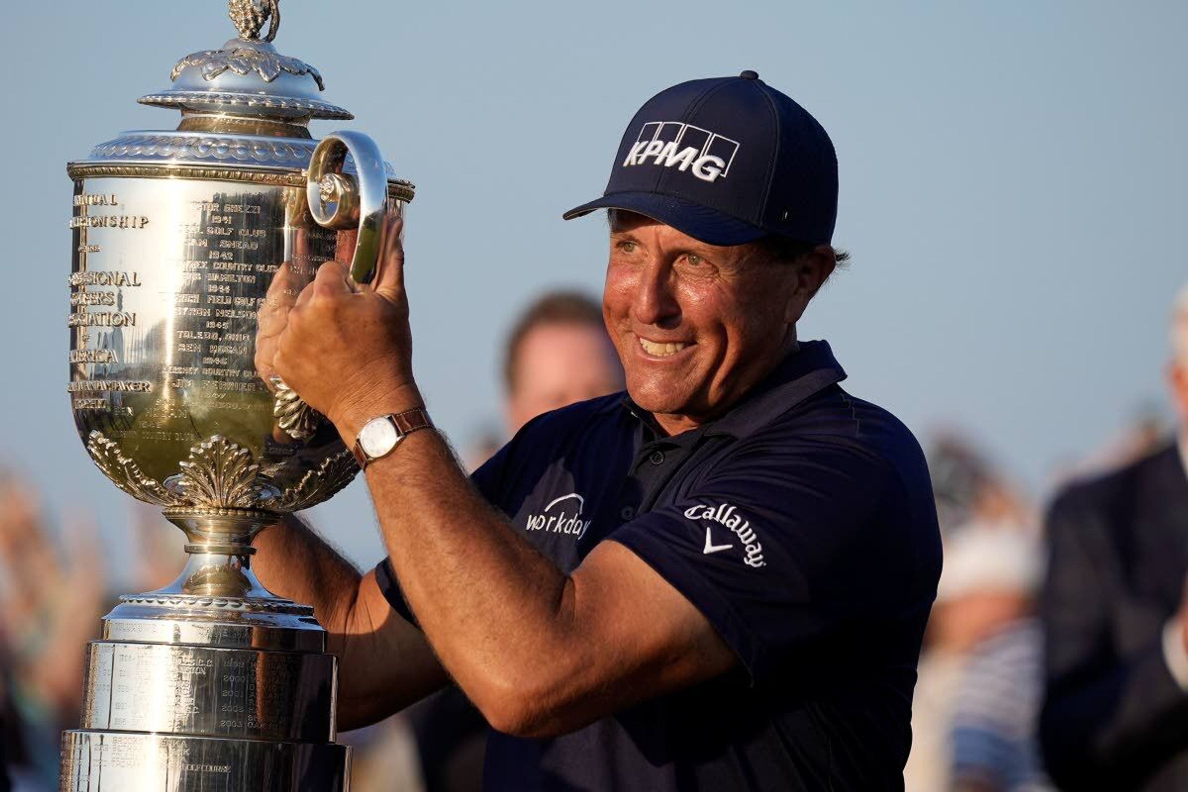 Phil Mickelson holds the Wanamaker Trophy after winning the PGA Championship golf tournament on the Ocean Course, Sunday, May 23, 2021, in Kiawah Island, S.C. (AP Photo/David J. Phillip)