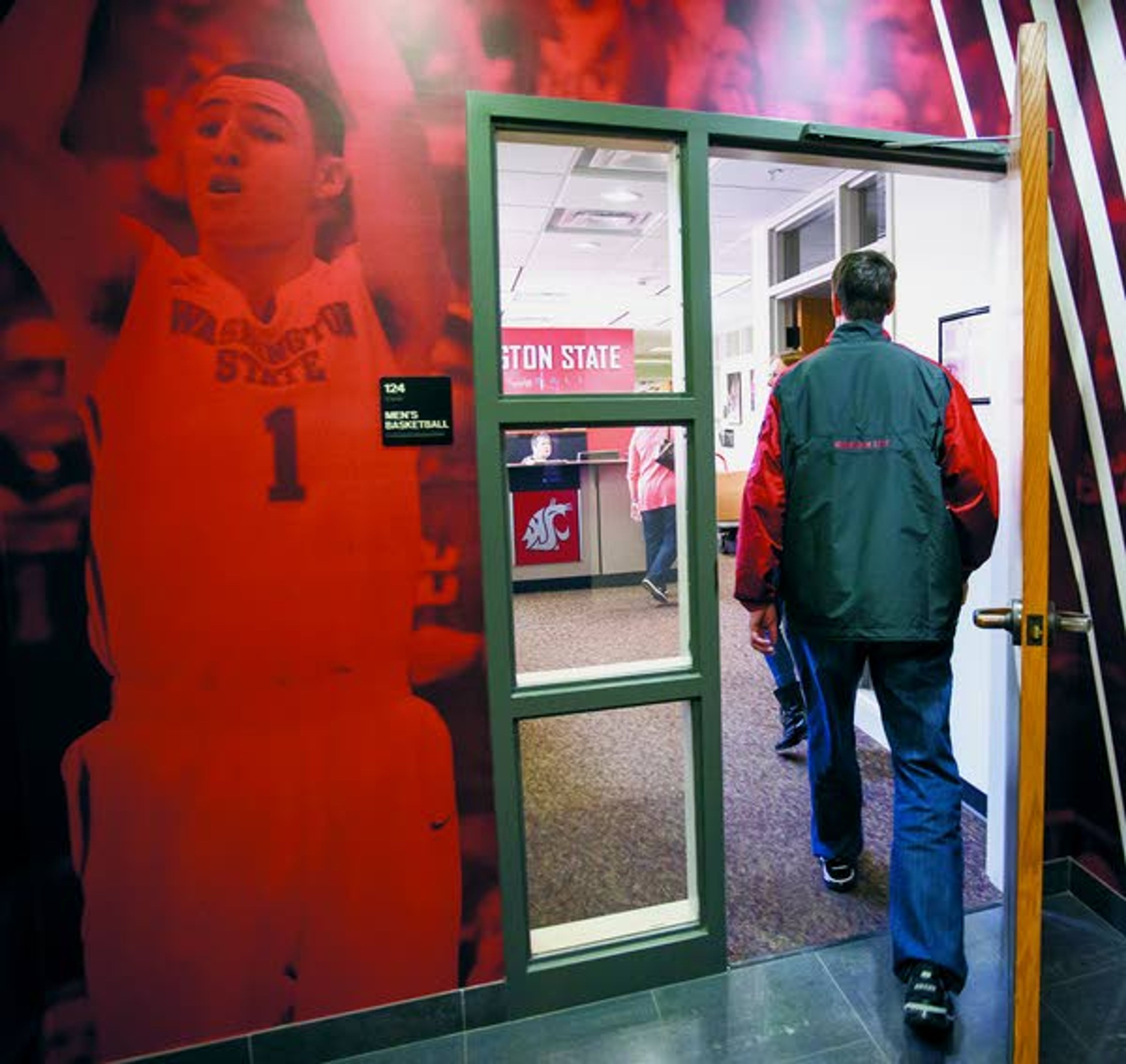 Former Washington State coach Ken Bone enters the basketball program offices in the Physical Education Building on Tuesday in Pullman.