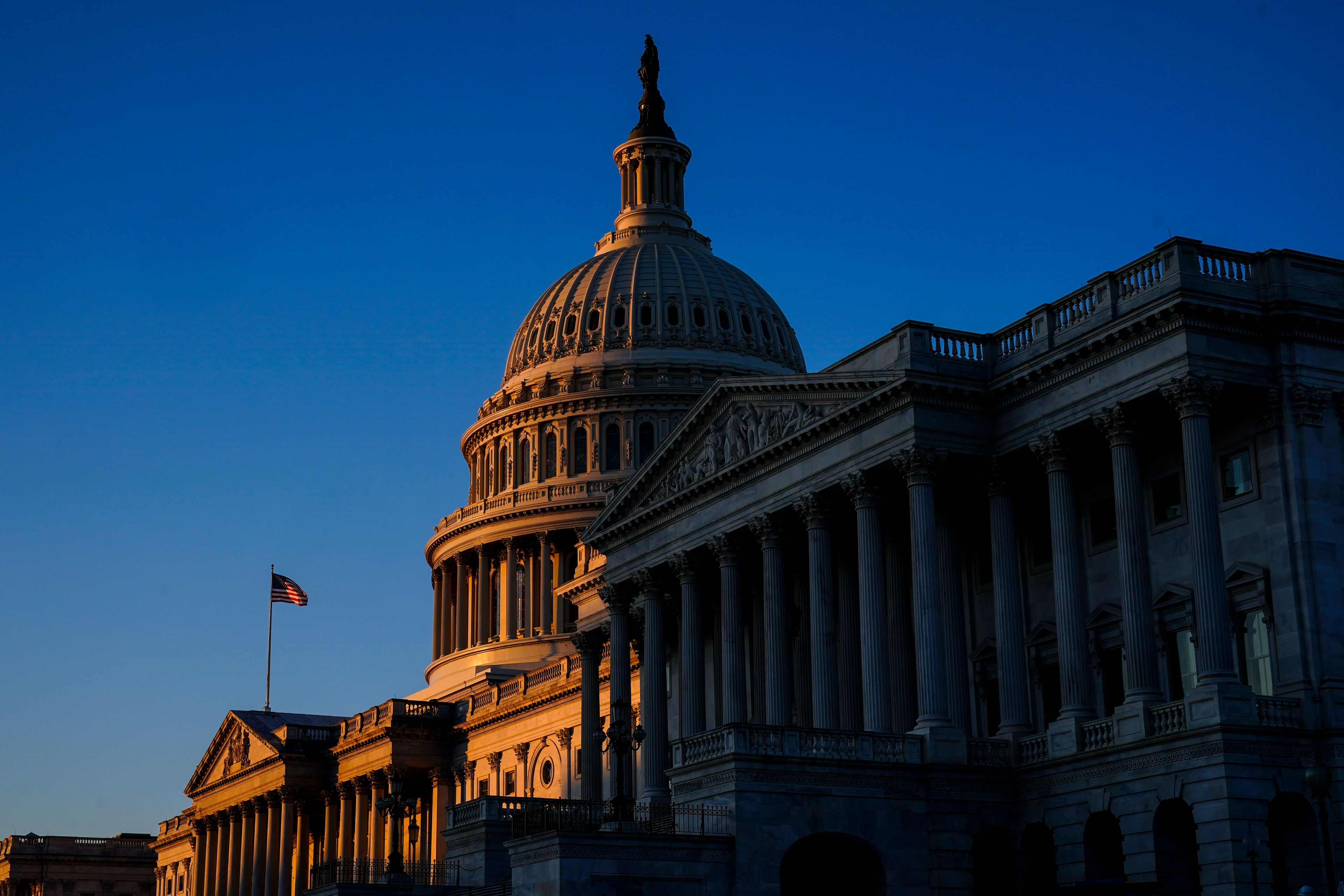 The sun rises at the U.S. Capitol on Monday as the House select committee investigating the Jan. 6 attack on the U.S. Capitol prepares to hold its final meeting on Capitol Hill in Washington.