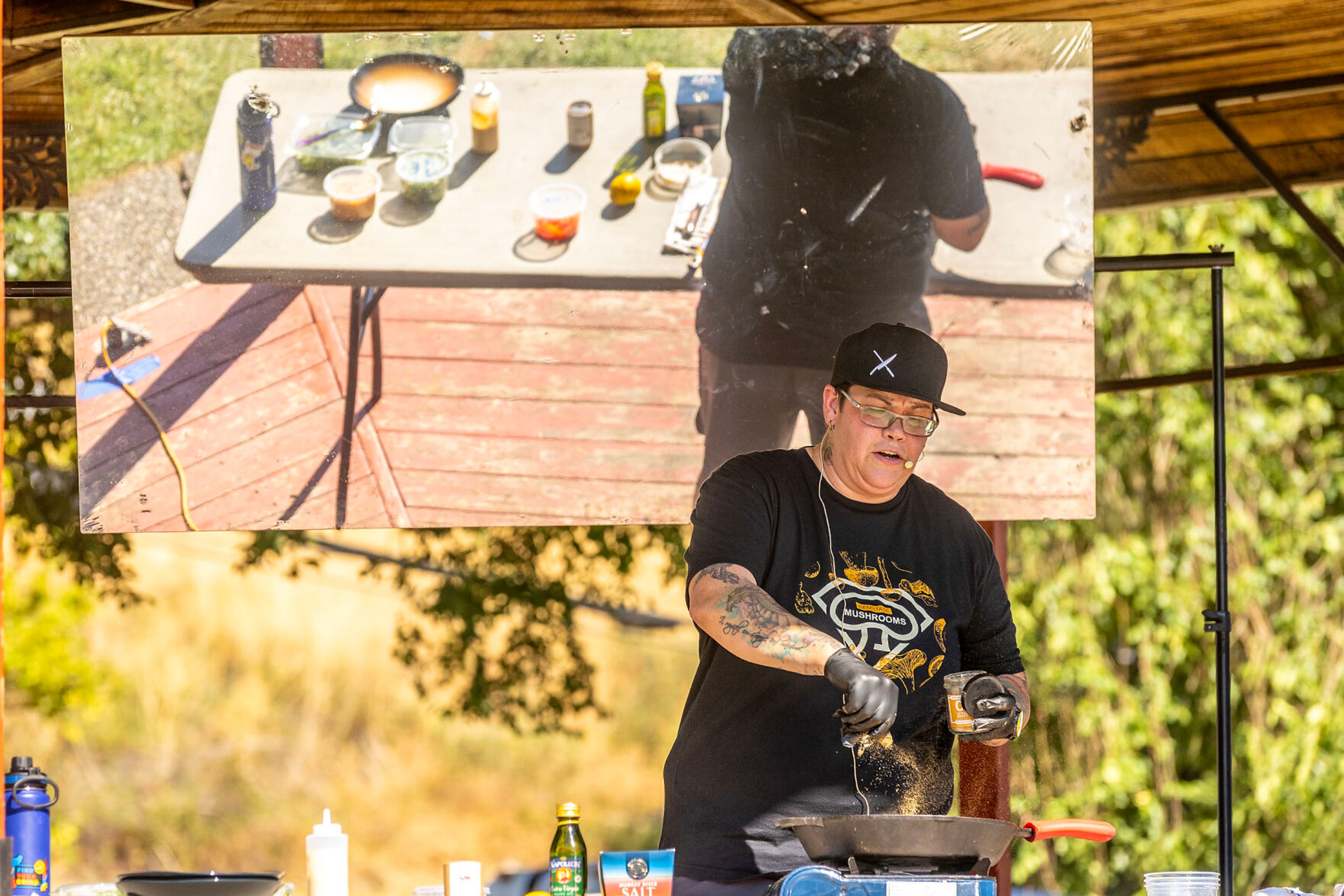 A chef takes people through a recipe Saturday at Lentil fest in Reaney Park in Pullman.