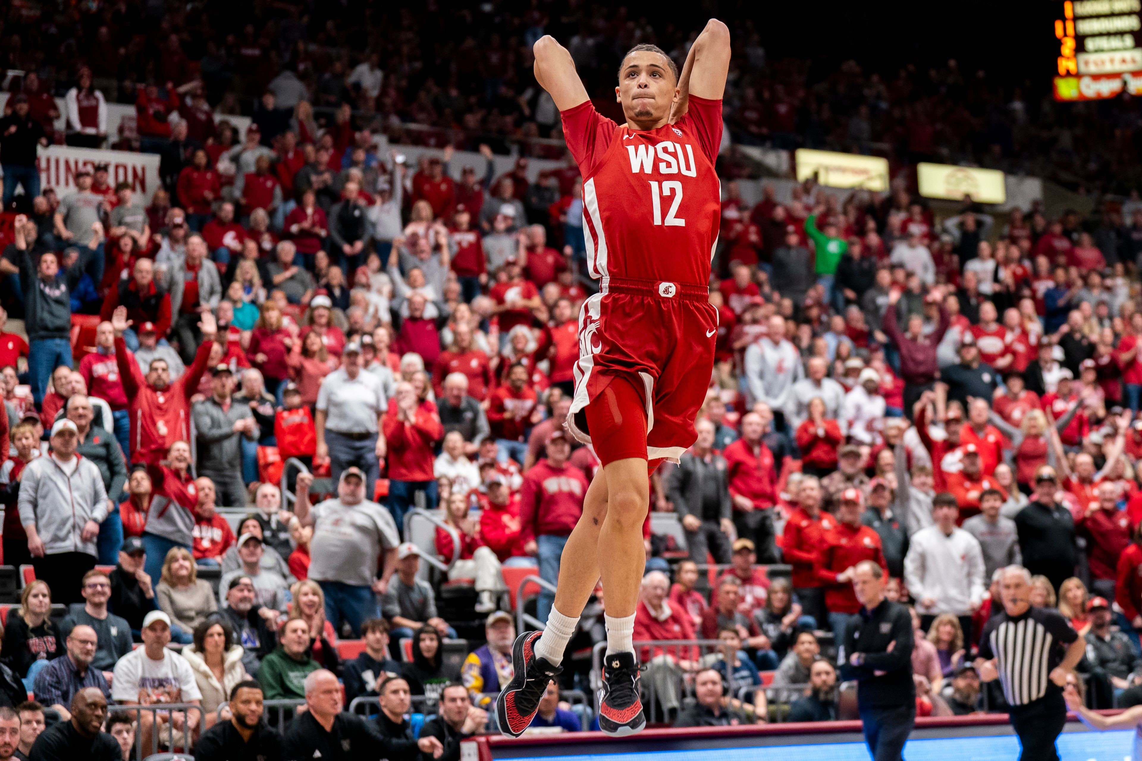 Washington State's Isaiah Watts goes for a dunk during an Apple Cup series game against Washington on March 7 at Beasley Coliseum in Pullman.