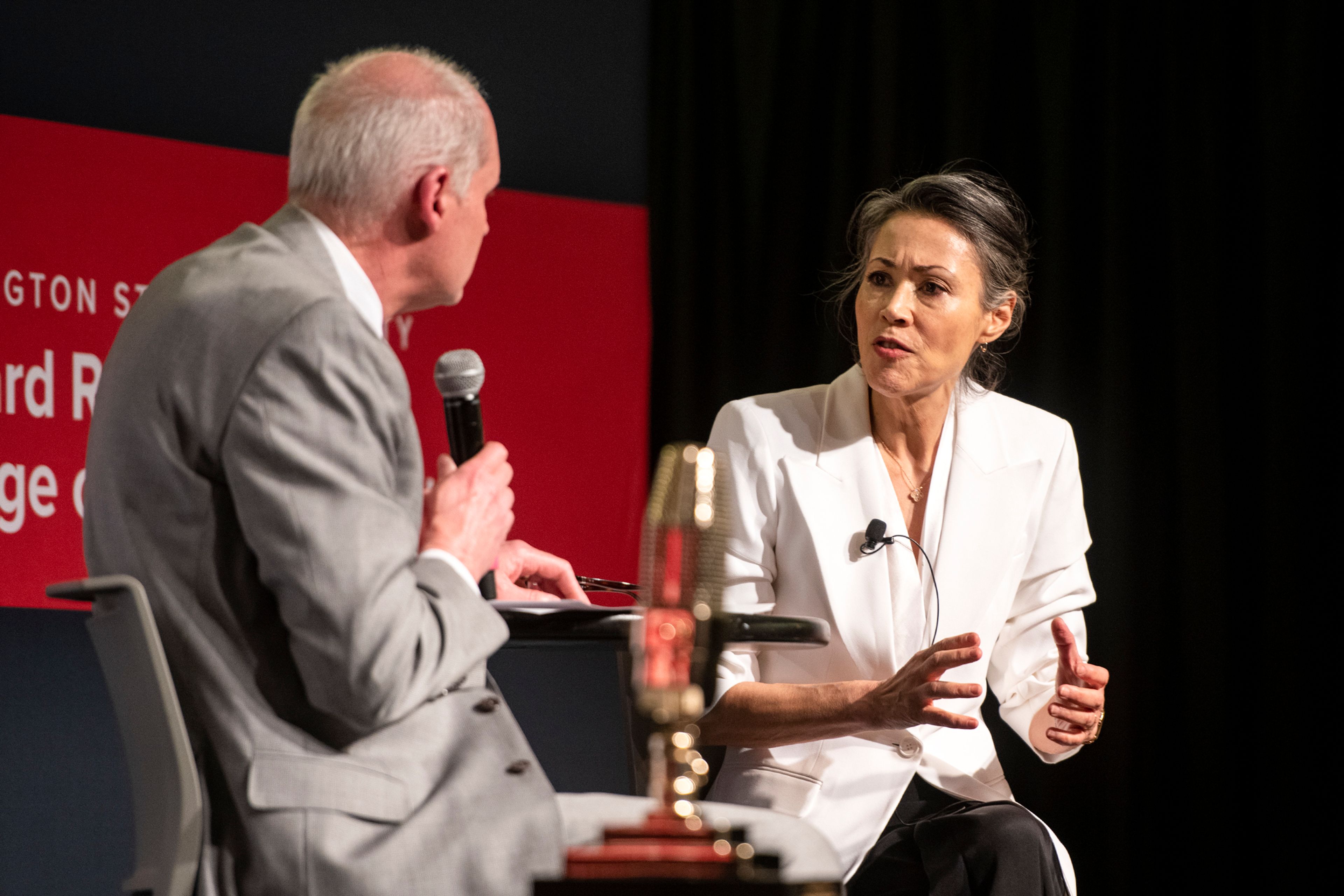 Bruce Pinkleton, dean of Washington State University’s Edward R. Murrow College of Communication, left, speaks with journalist Ann Curry on Tuesday at the 46th annual Murrow Symposium at WSU’s Compton Union Building in Pullman.