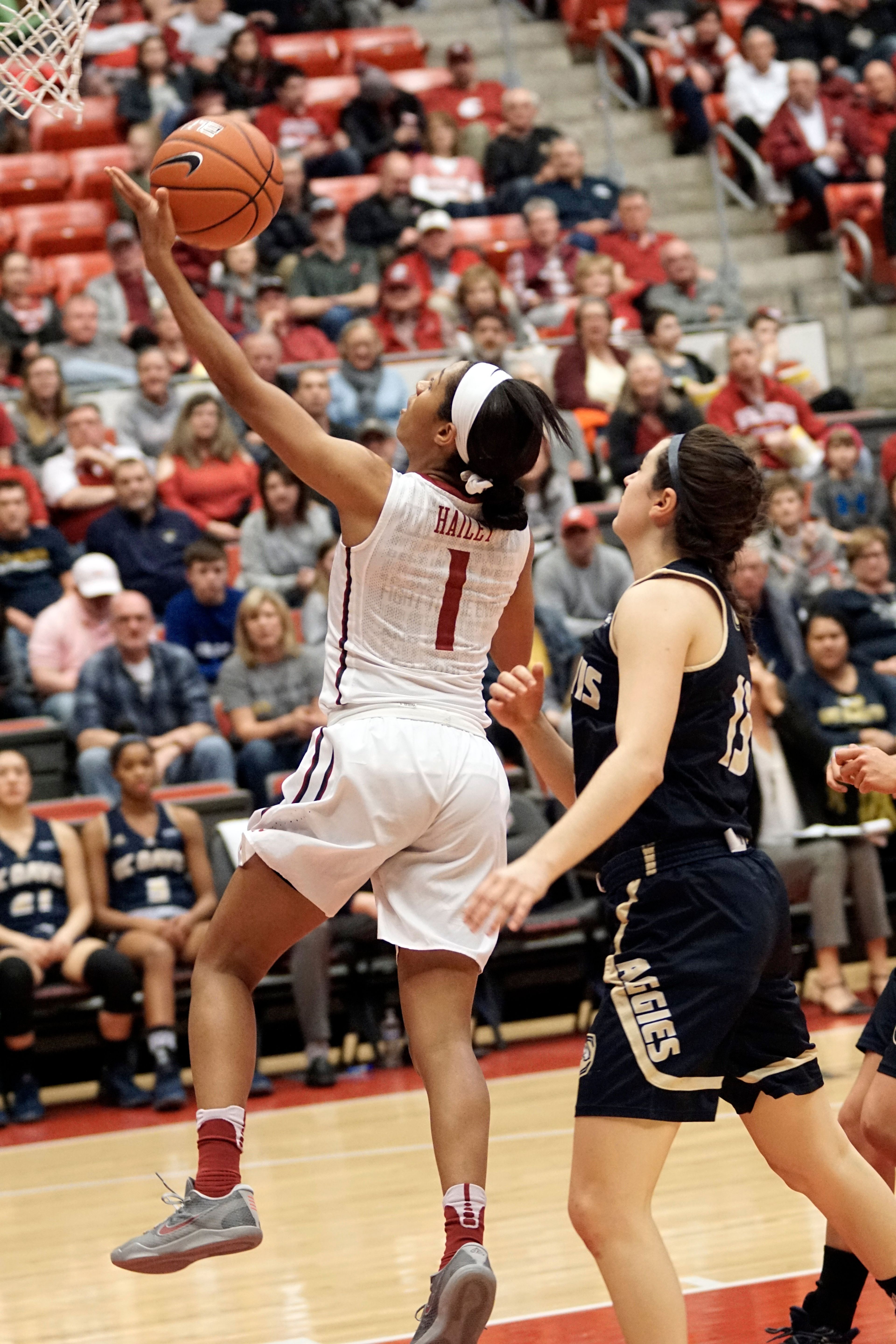 Washington State's Caila Hailey (1) drops in a layup against UC Davis during a third round game of the WNIT at Beasely Coliseum Thursday night.