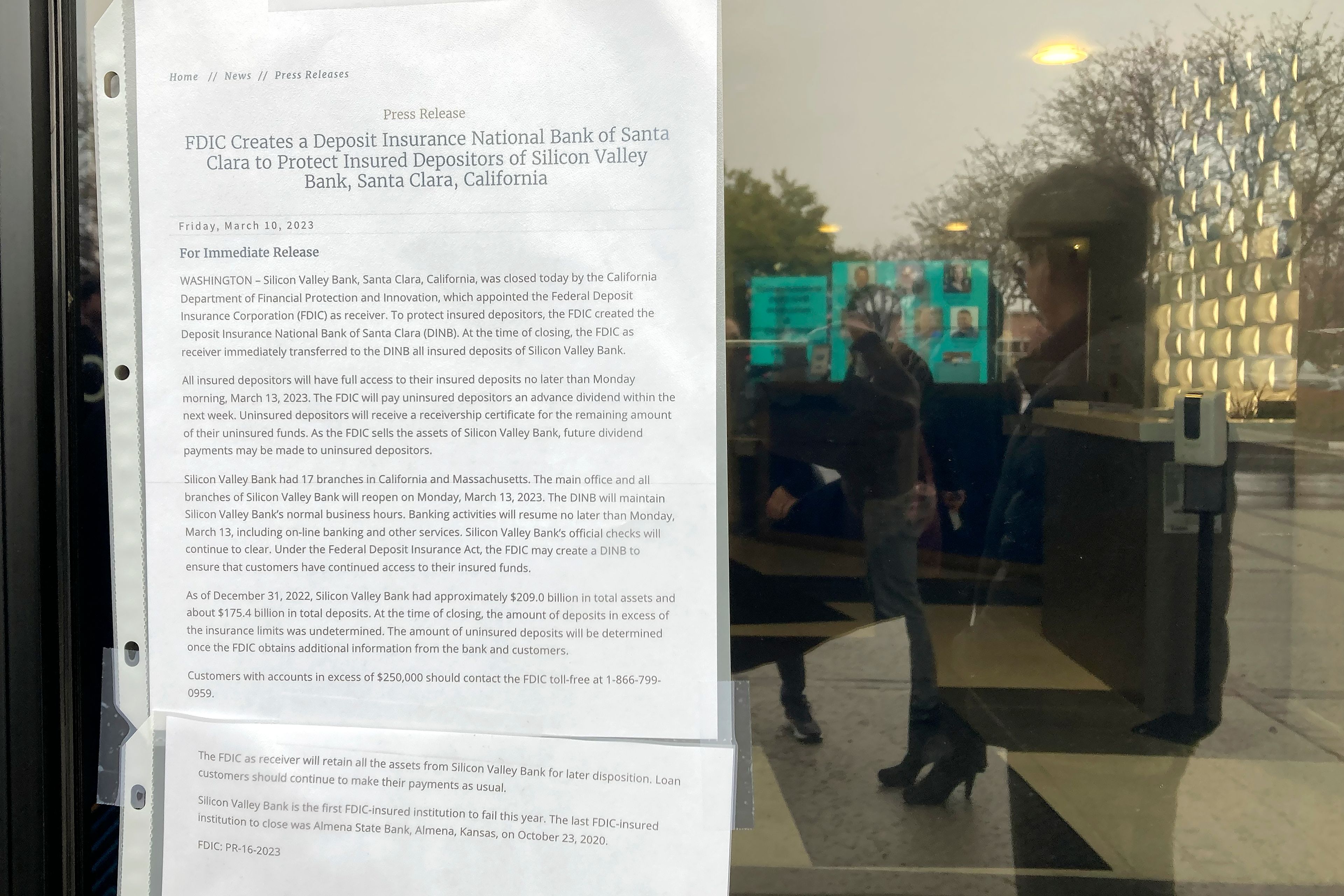 A sign posted at entrance to Silicon Valley Bank is shown in Santa Clara, Calif., Friday, March 10, 2023. The Federal Deposit Insurance Corporation seized the assets of the bank on Friday, marking the largest bank failure since Washington Mutual during the height of the 2008 financial crisis. (AP Photo/Jeff Chiu)