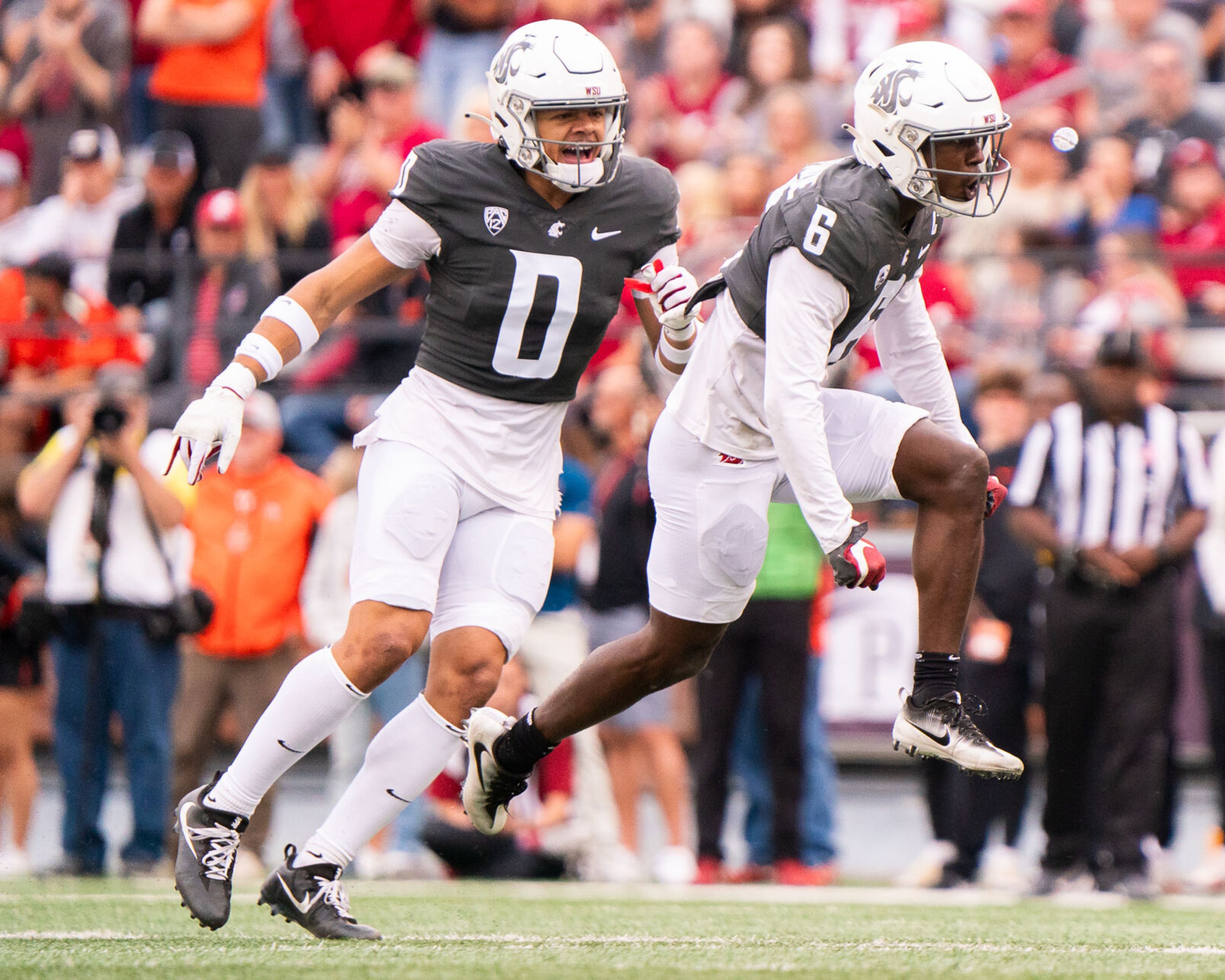 Washington State defensive back Chau Smith-Wade (6) celebrates after getting a tackle for loss during a game against Oregon State on Sept. 23 at Gesa Field in Pullman.