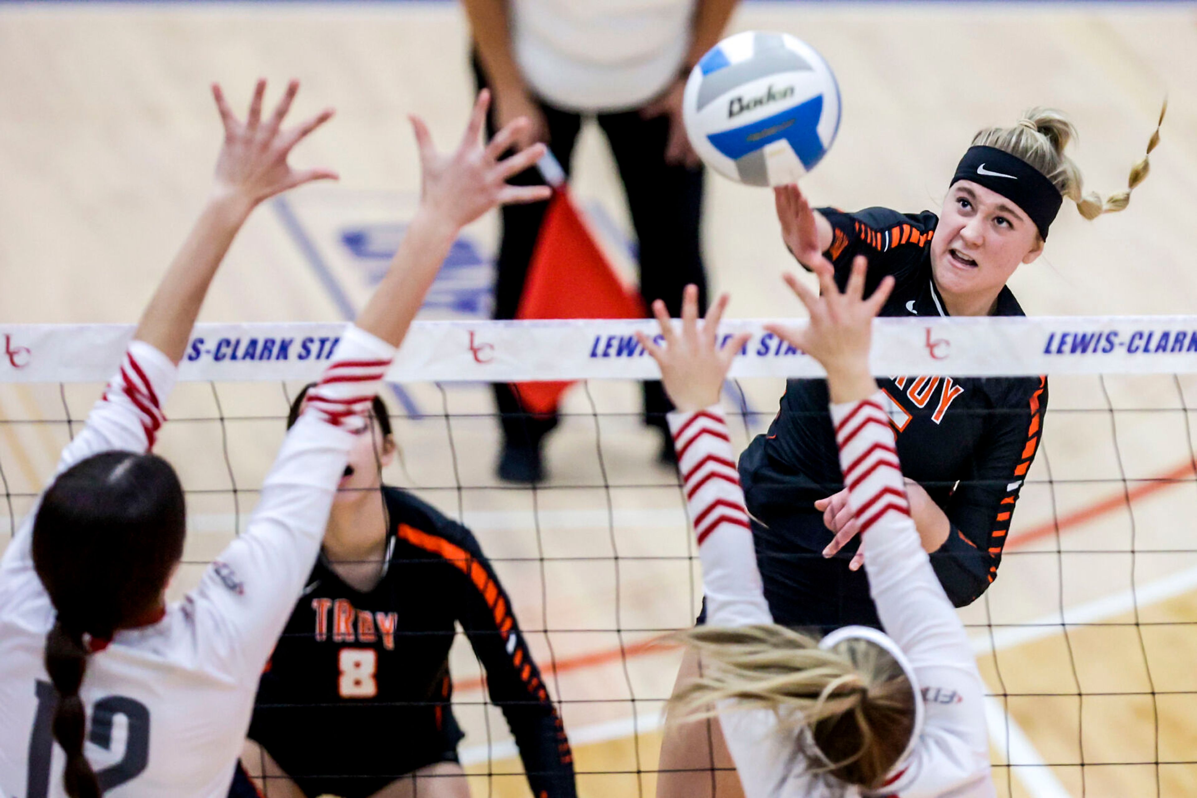 Troy outside hitter Morgan Blazzard spikes the ball against Grace at the Lewis-Clark State College Athletic Center on Saturday. Troy defeated Grace in three sets to become the 1A DI state champions.