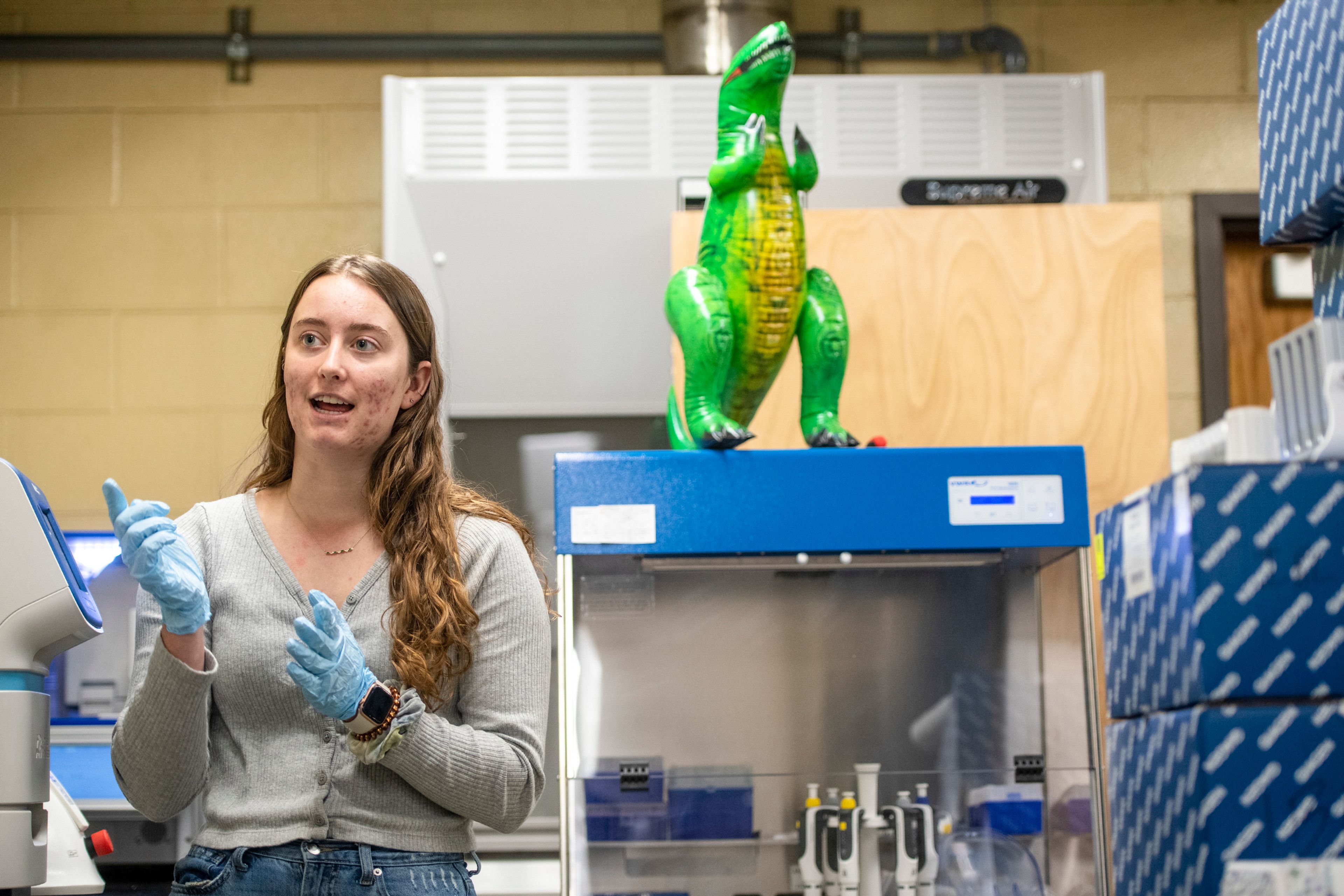 Research specialist Solana Narum of University of Idaho’s Department of Civil and Environmental Engineering explains how specific equipment is used to study COVID-19 levels through regional wastewater inside the Buchanan Engineering Laboratory on Friday afternoon on campus in Moscow.