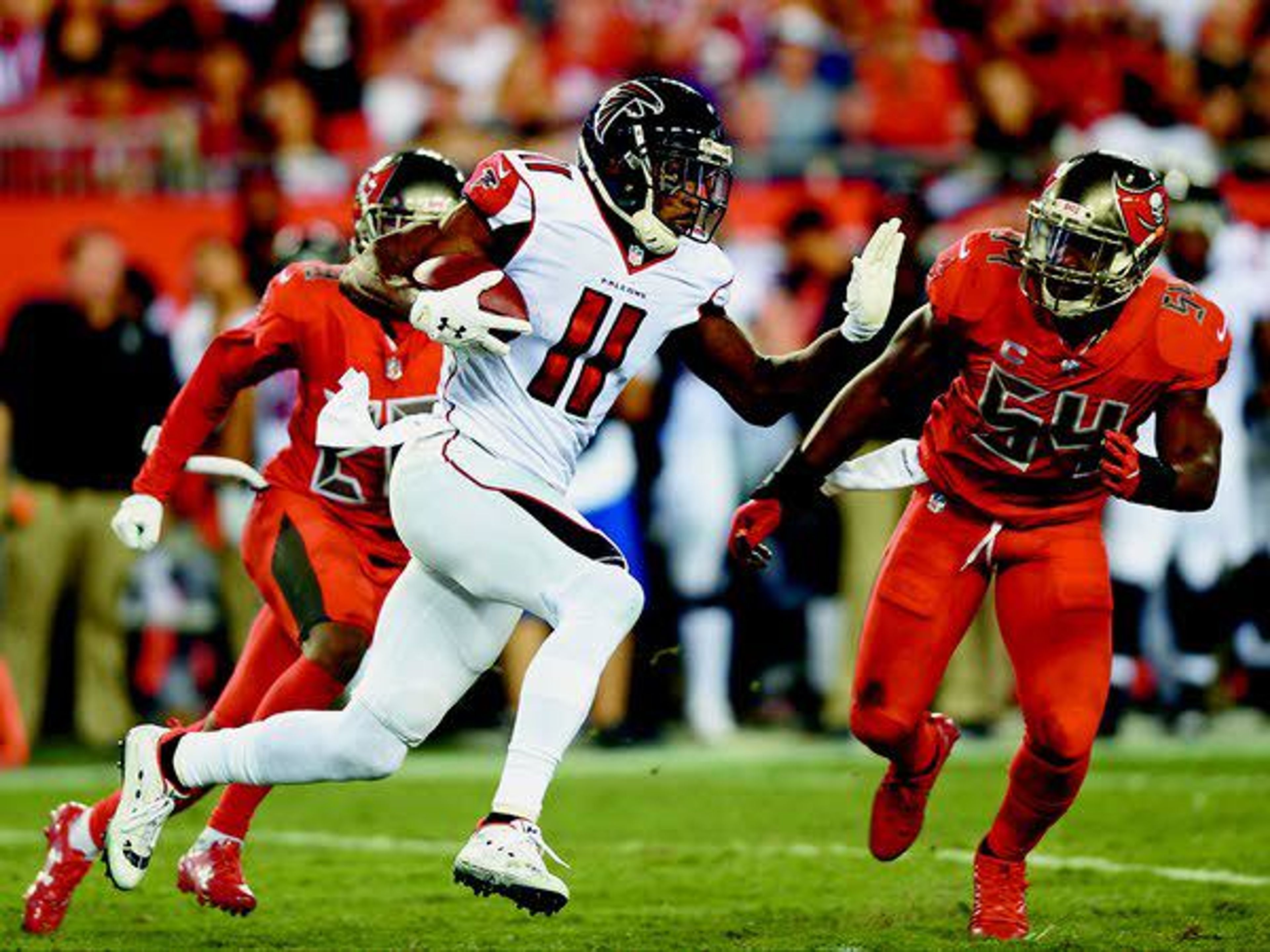 Ryan throws for 4 touchdowns, leads Falcons over Tampa Bay