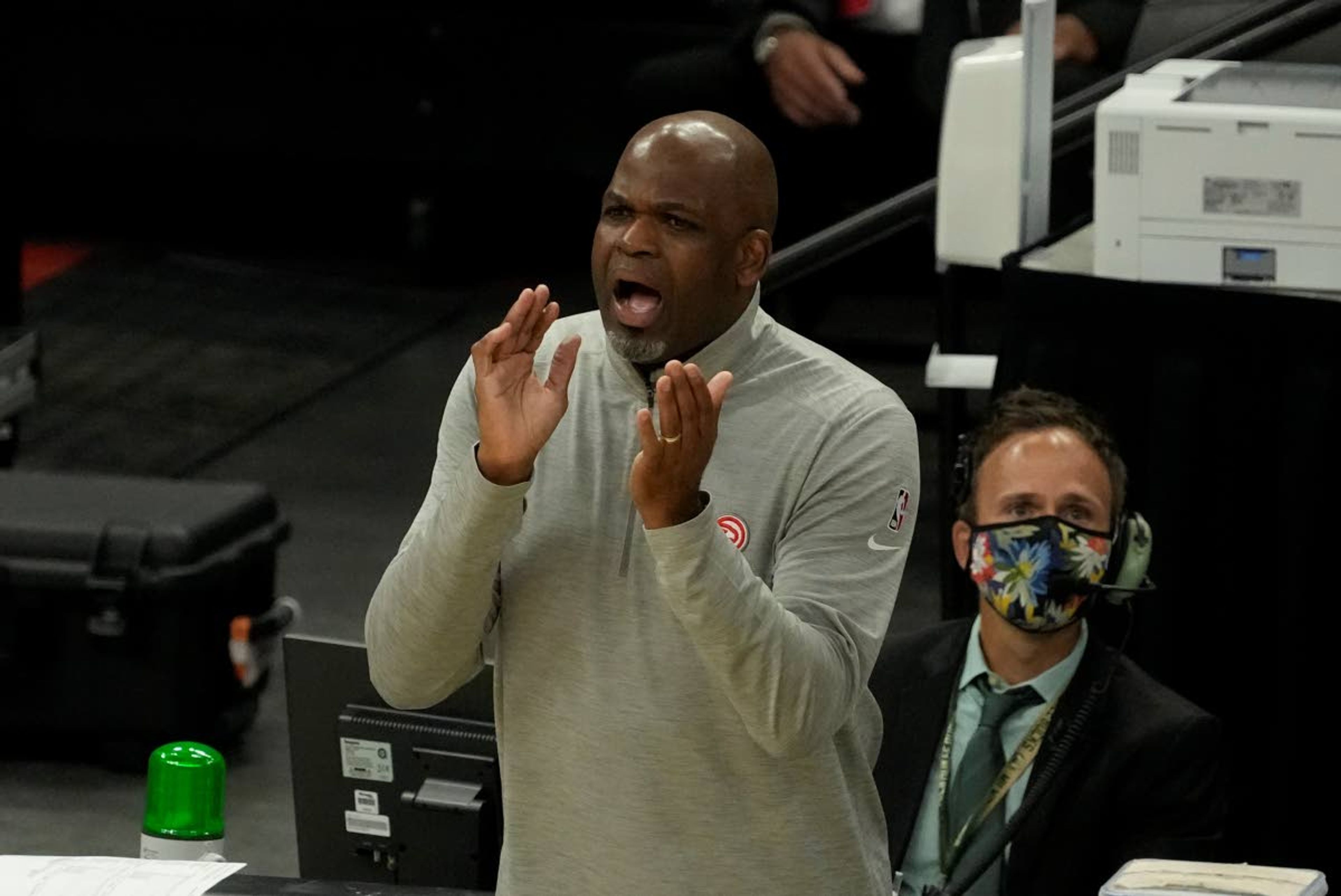 Atlanta Hawks head coach Nate McMillan reacts during the second half of Game 1 of the NBA Eastern Conference basketball finals game against the Milwaukee Bucks Wednesday, June 23, 2021, in Milwaukee. (AP Photo/Morry Gash)