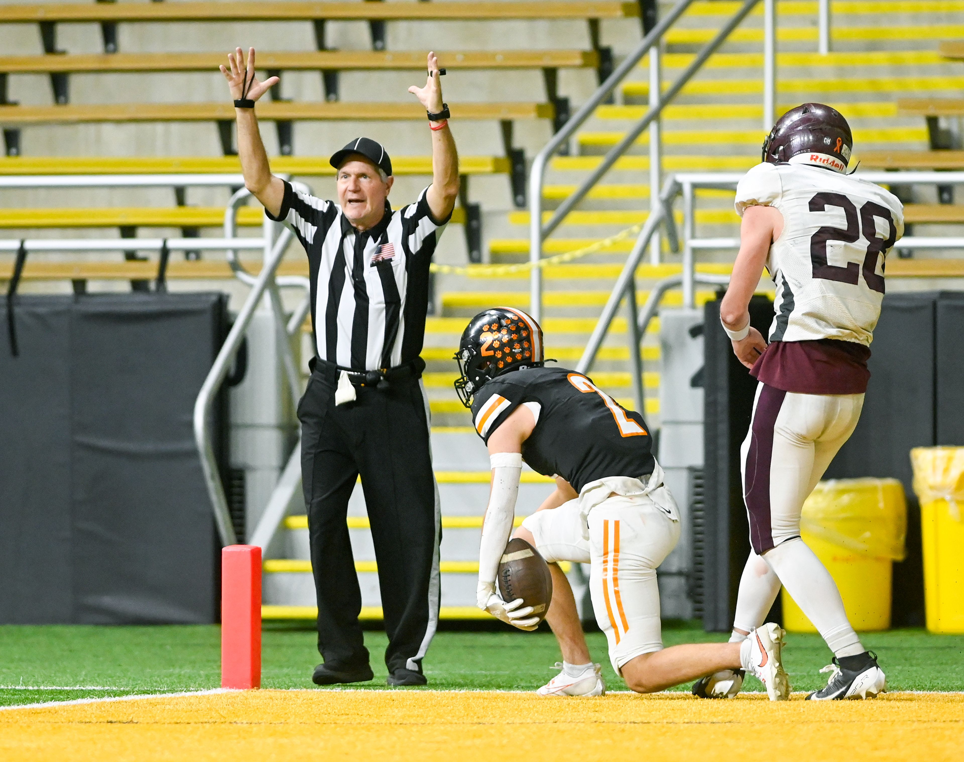 A touchdown is called after Kendrick’s Ralli Roetcisoender lands in the end zone during an Idaho Class 2A state quarterfinal game against Kamiah at the P1FCU Kibbie Dome in Moscow.