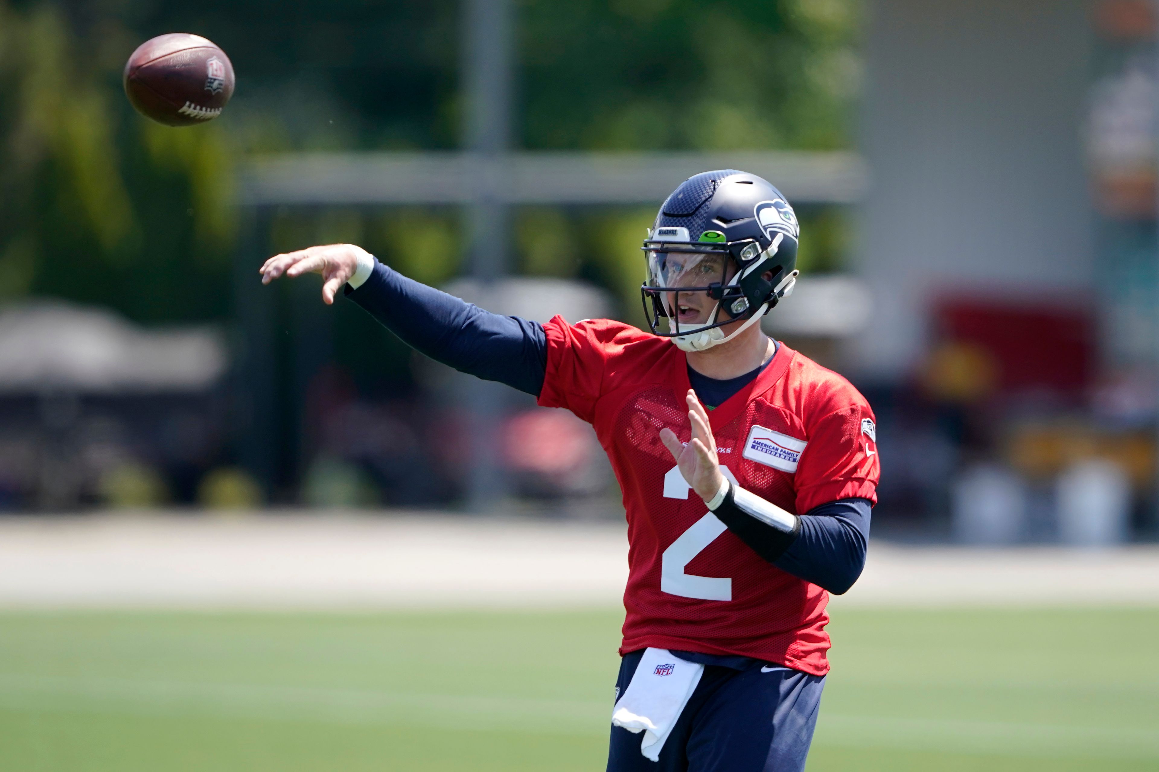 Associated PressQuarterback Drew Lock throws a pass during Monday’s practice.