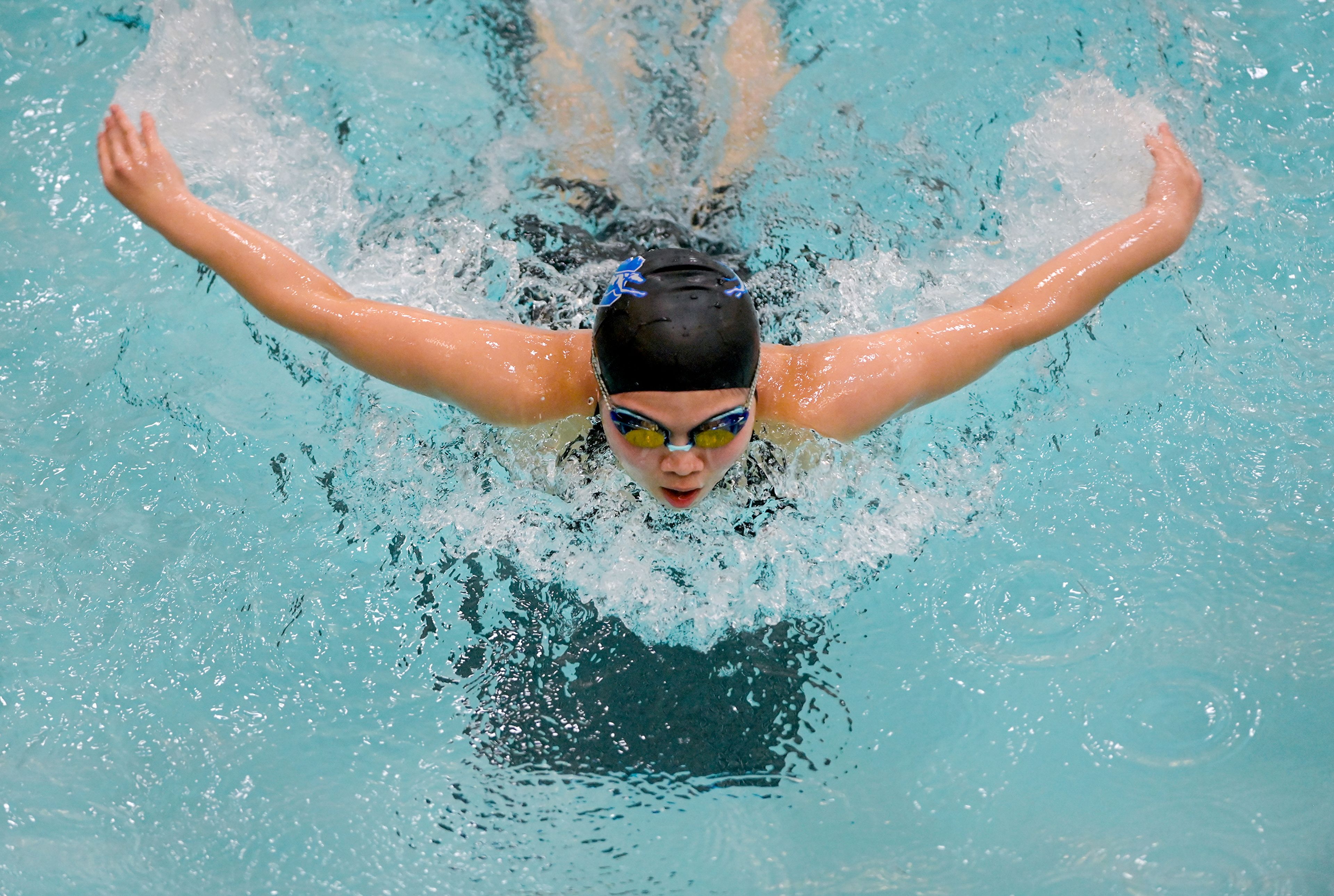 Pullman junior Vivien Lin competes in a 100-yard butterfly heat Thursday at the Eastern Washington District Swim Championship at Washington State University in Pullman.