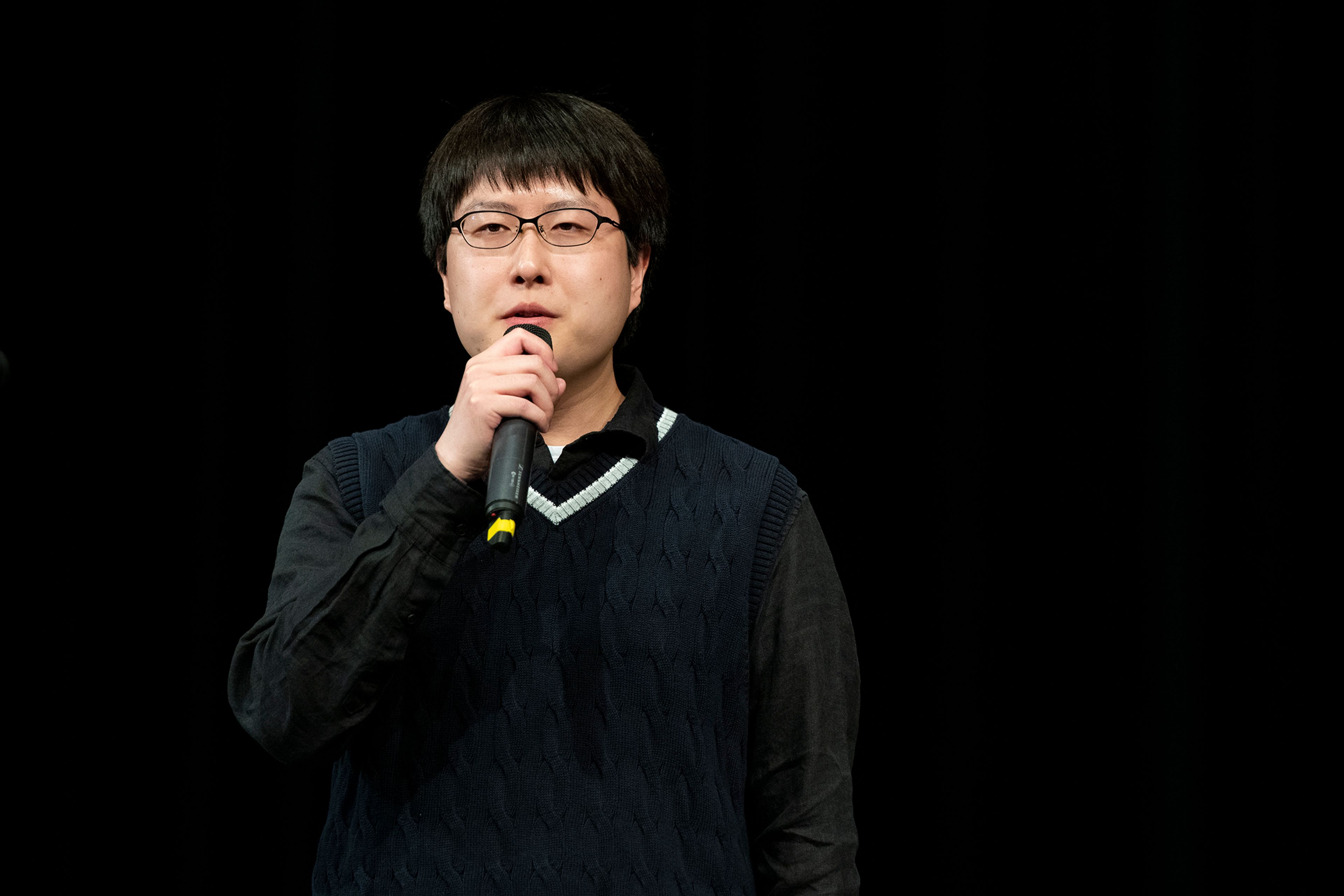 Arthur Jia performs a Chinese pop song Friday at Pullman High School’s multicultural night.