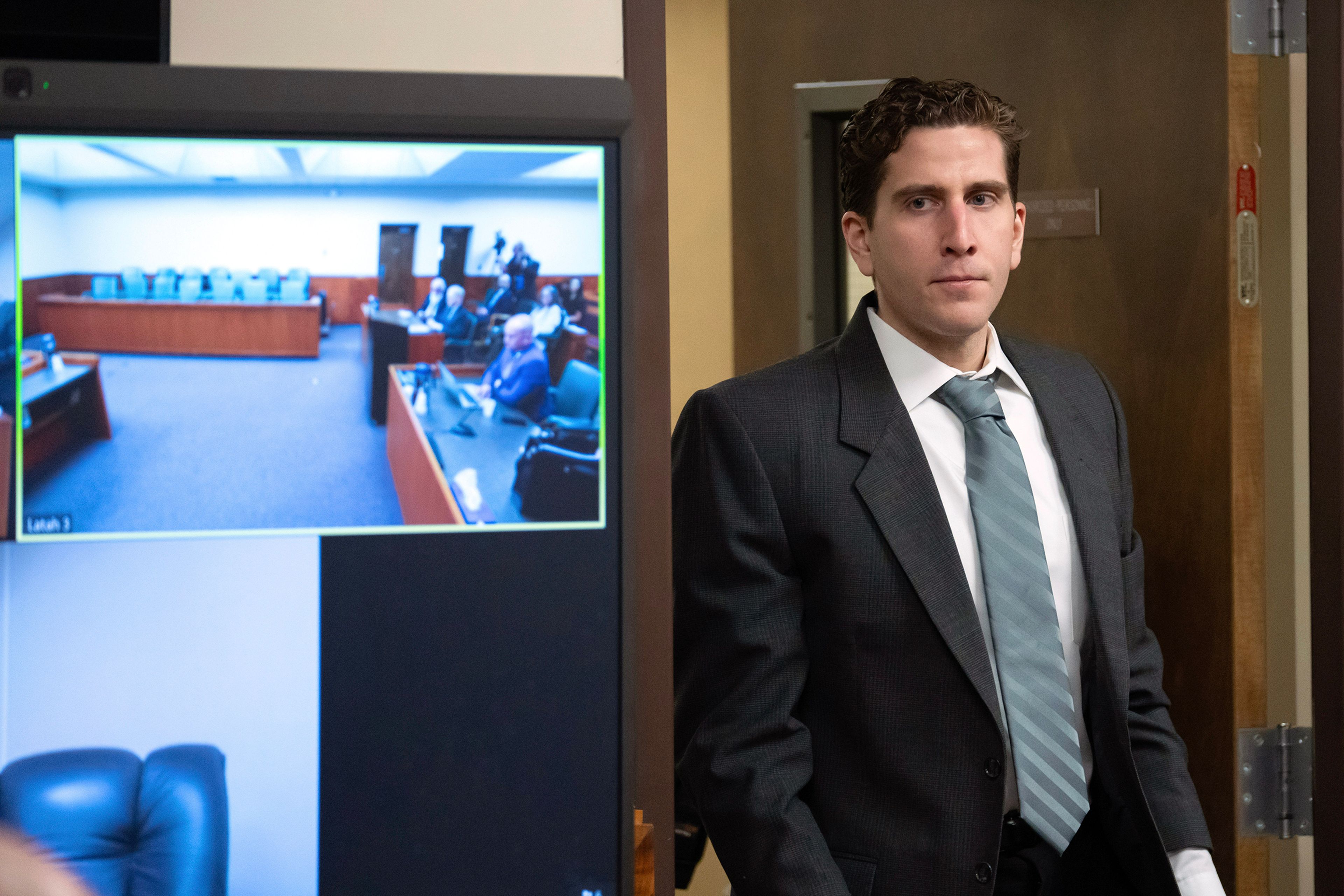 Bryan Kohberger, who is accused of killing four University of Idaho students in November 2022, enters a courtroom to appear at a hearing in Latah County District Court, Wednesday, Sept. 13, 2023, in Moscow, Idaho. Kohberger's attorneys want cameras banned from the courtroom, contending that news coverage of the criminal proceedings has violated a judge's orders and threatens his right to a fair trial. (AP Photo/Ted S. Warren, Pool)