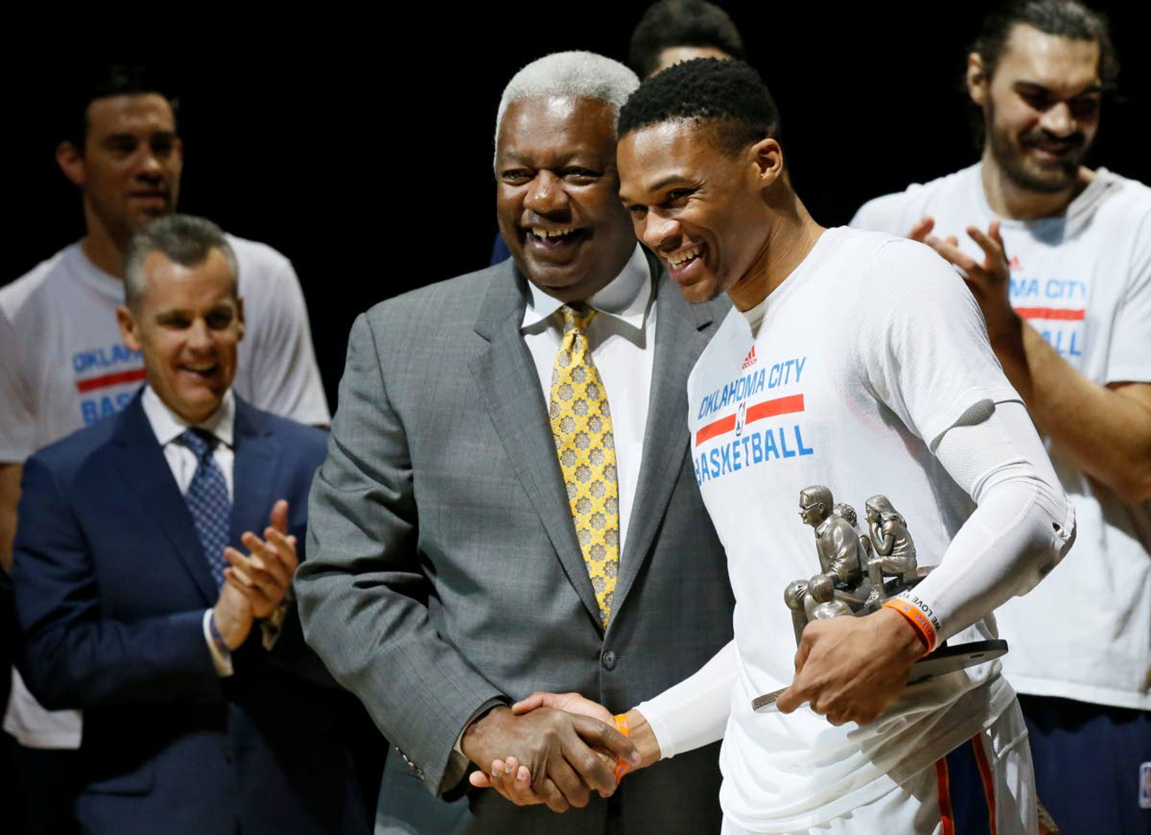 FILE - Then-Oklahoma City Thunder guard Russell Westbrook, right, is congratulated by Oscar Robertson on his single season triple-double record before an NBA basketball game between the Denver Nuggets and the Oklahoma City Thunder in Oklahoma City, Okla., in this Wednesday, April 12, 2017, file photo. Westbrook’s stat lines have been looking like typos in the box score lately, and now he’s on the verge of something historic. The Washington Wizards point guard’s next triple-double – which could come as soon as Saturday, May 8, 2021, will be the 181st of his career, tying Oscar Robertson’s NBA record. (AP Photo/Sue Ogrocki, File)