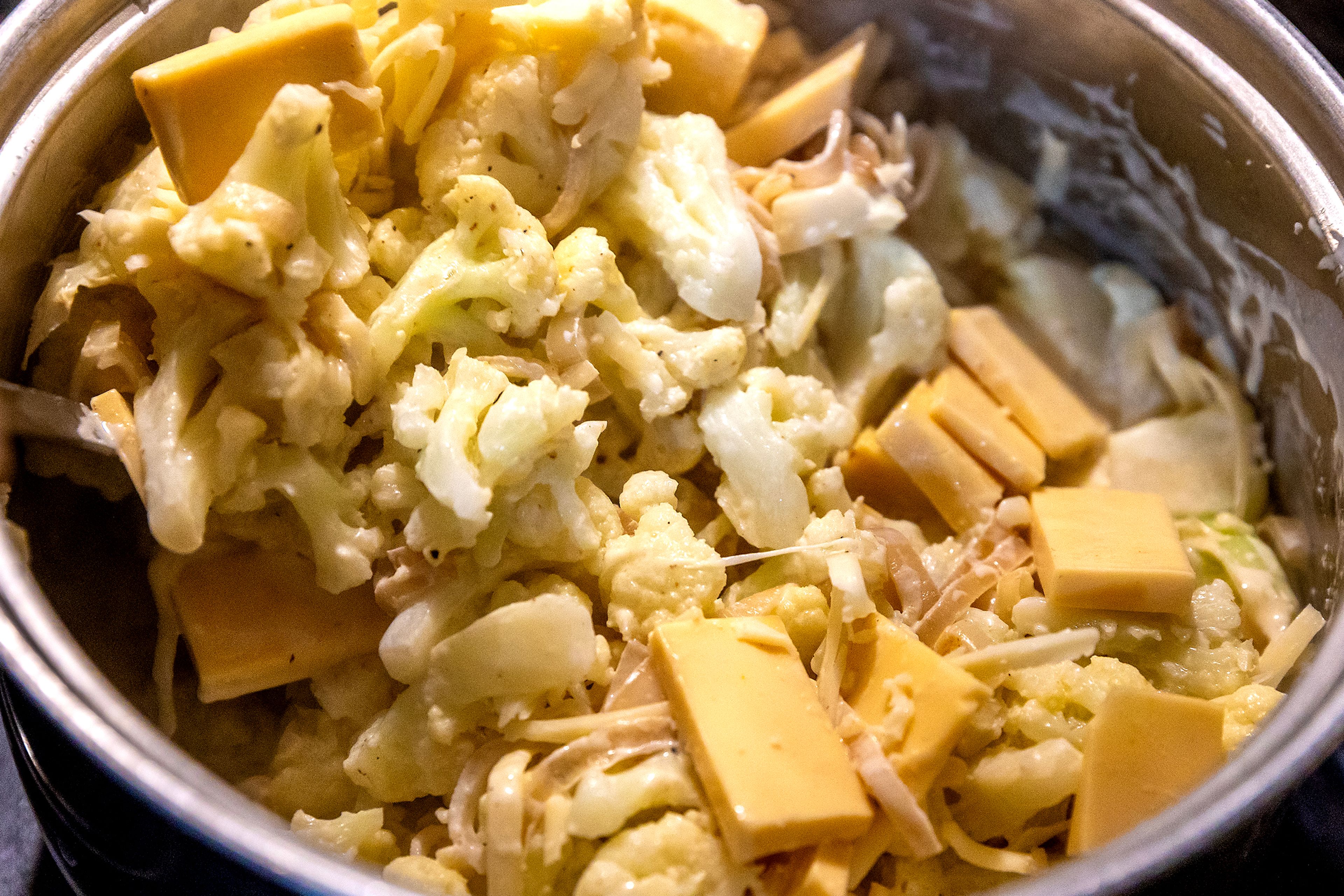 Cauliflower is mixed together with three types of cheese Sunday in Lewiston.