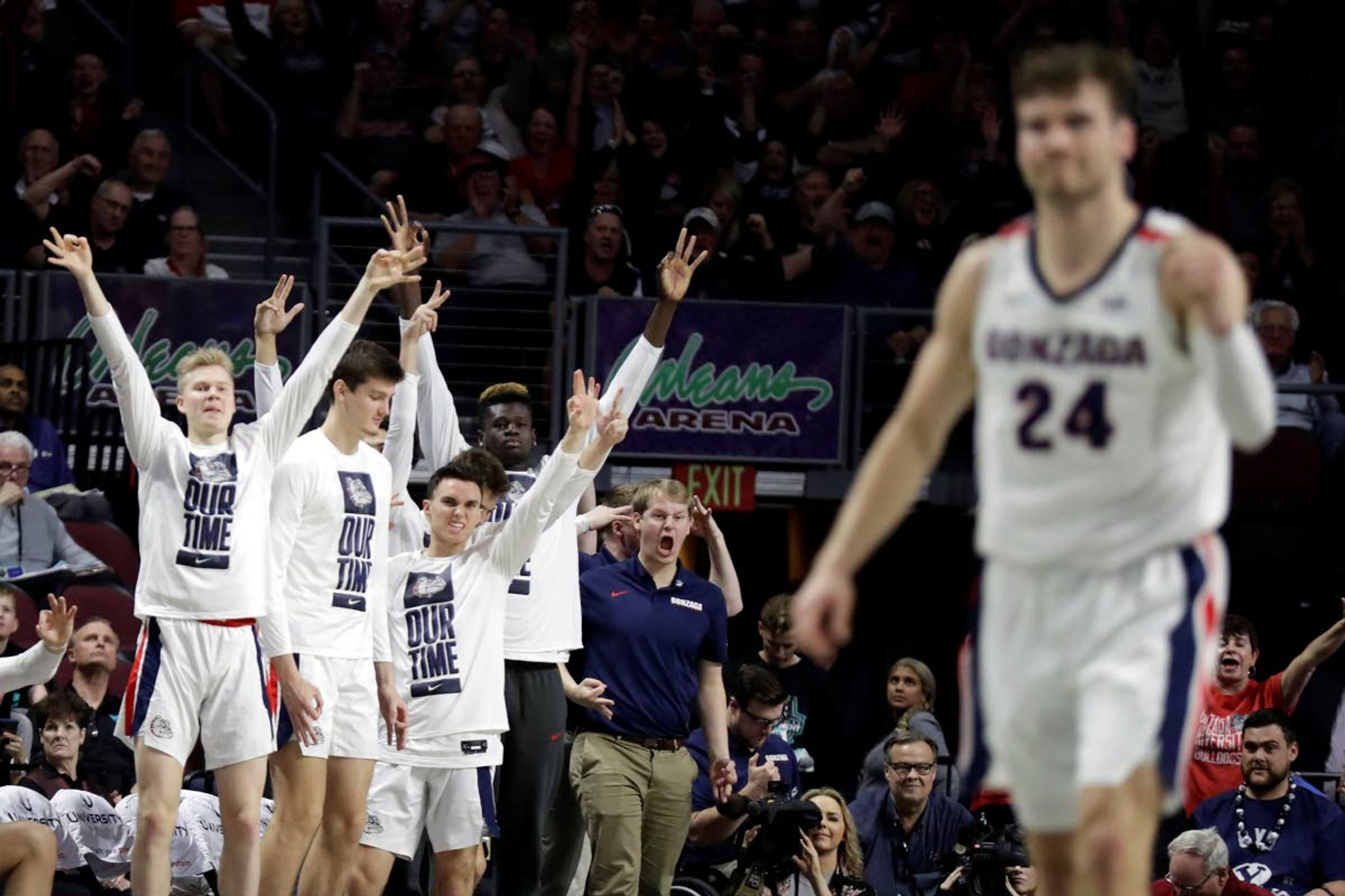 The Gonzaga bench reacts after a three-point basket during the first half of an NCAA college basketball game against San Francisco in the West Coast Conference men's tournament Monday, March 9, 2020, in Las Vegas. (AP Photo/Isaac Brekken)