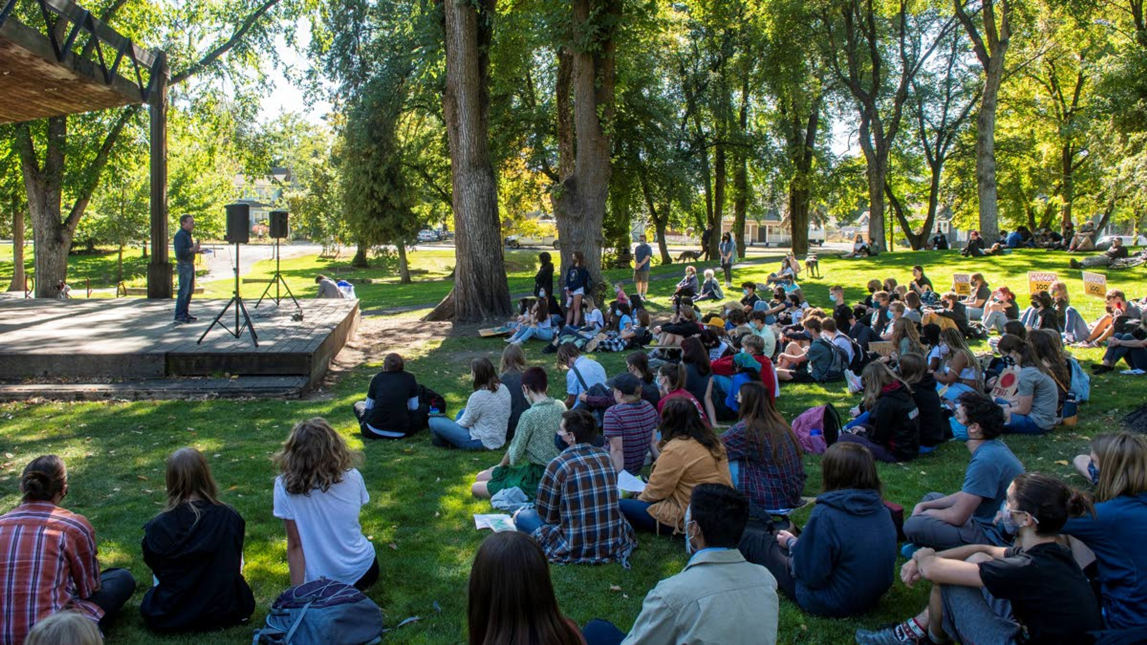 A crowd listens to speaker Michael Jennings, an ecologist and researcher at the University of Idaho, during the Fridays for Future strike at East City Park in Moscow on Friday morning.