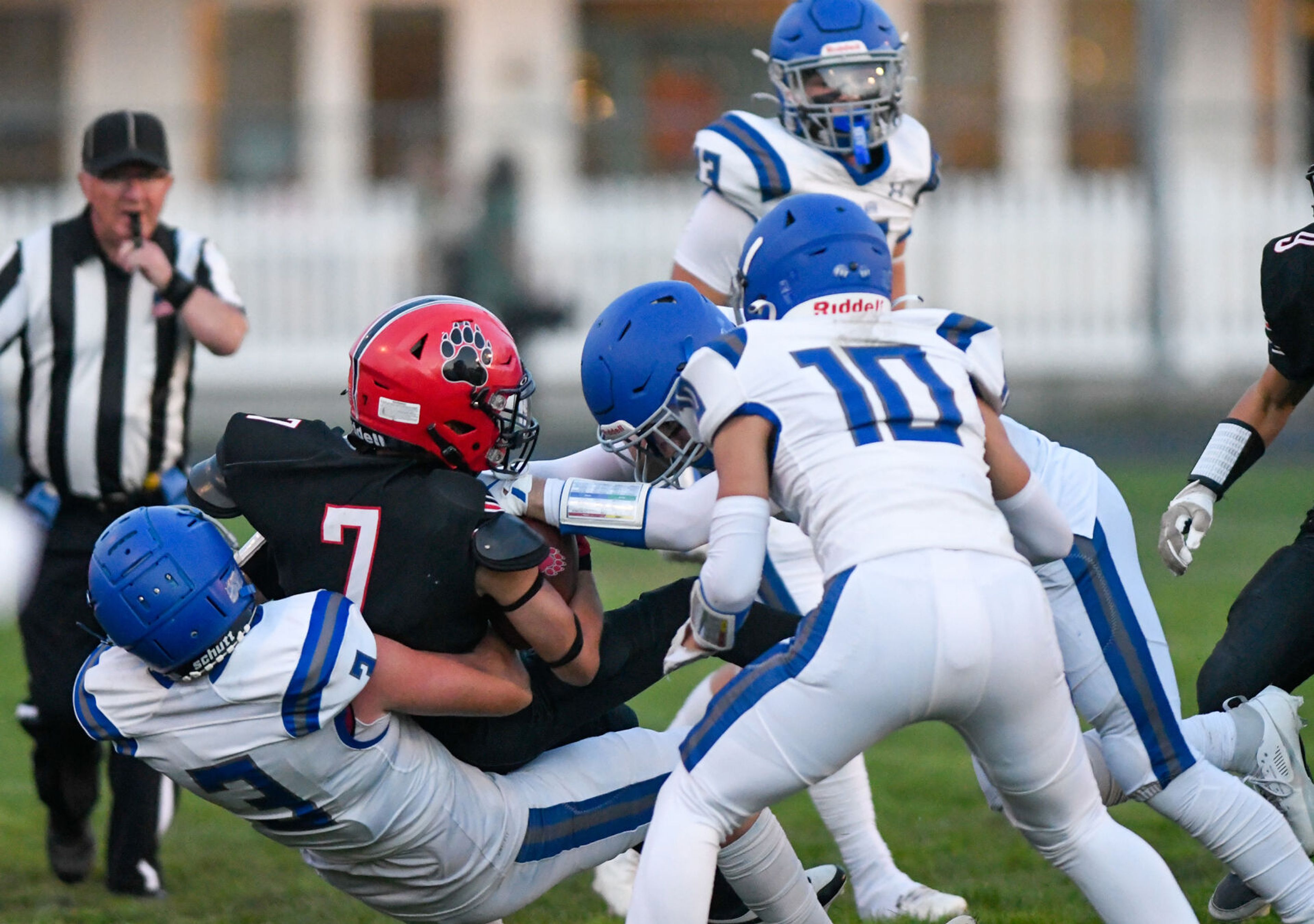 Moscow running back Keaton Frei is tackled by Pullman defensive back Evan Anderson Friday in Moscow.