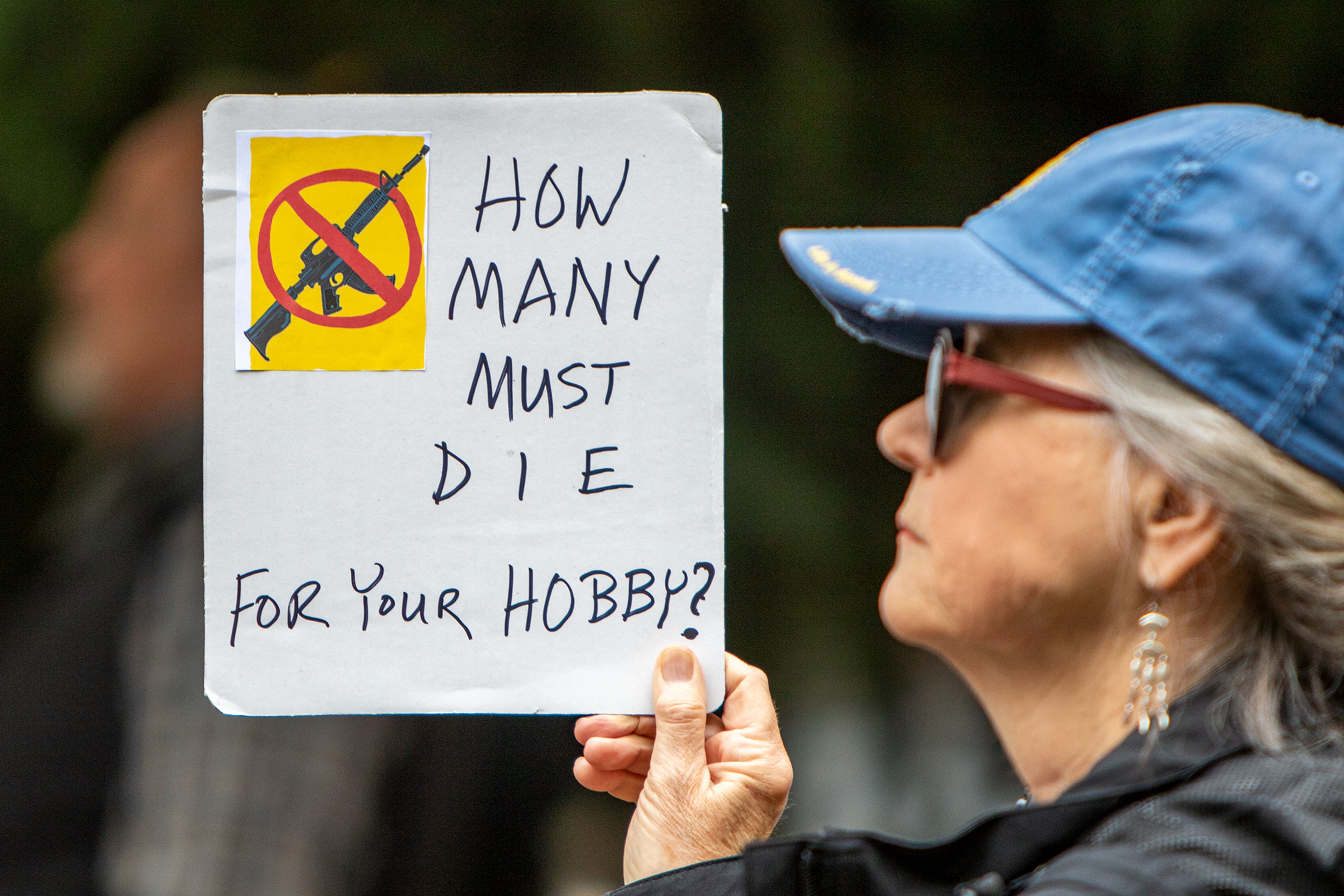 A protestor against gun violence holds a home made sign during a March for Our Lives rally Saturday morning at Brackenbury Square in downtown Lewiston. March for Our Lives rallies protesting gun violence were held across the country today after the recent occurance of horrific mass shootings in towns like Uvalde, Texas and Buffalo, New York.