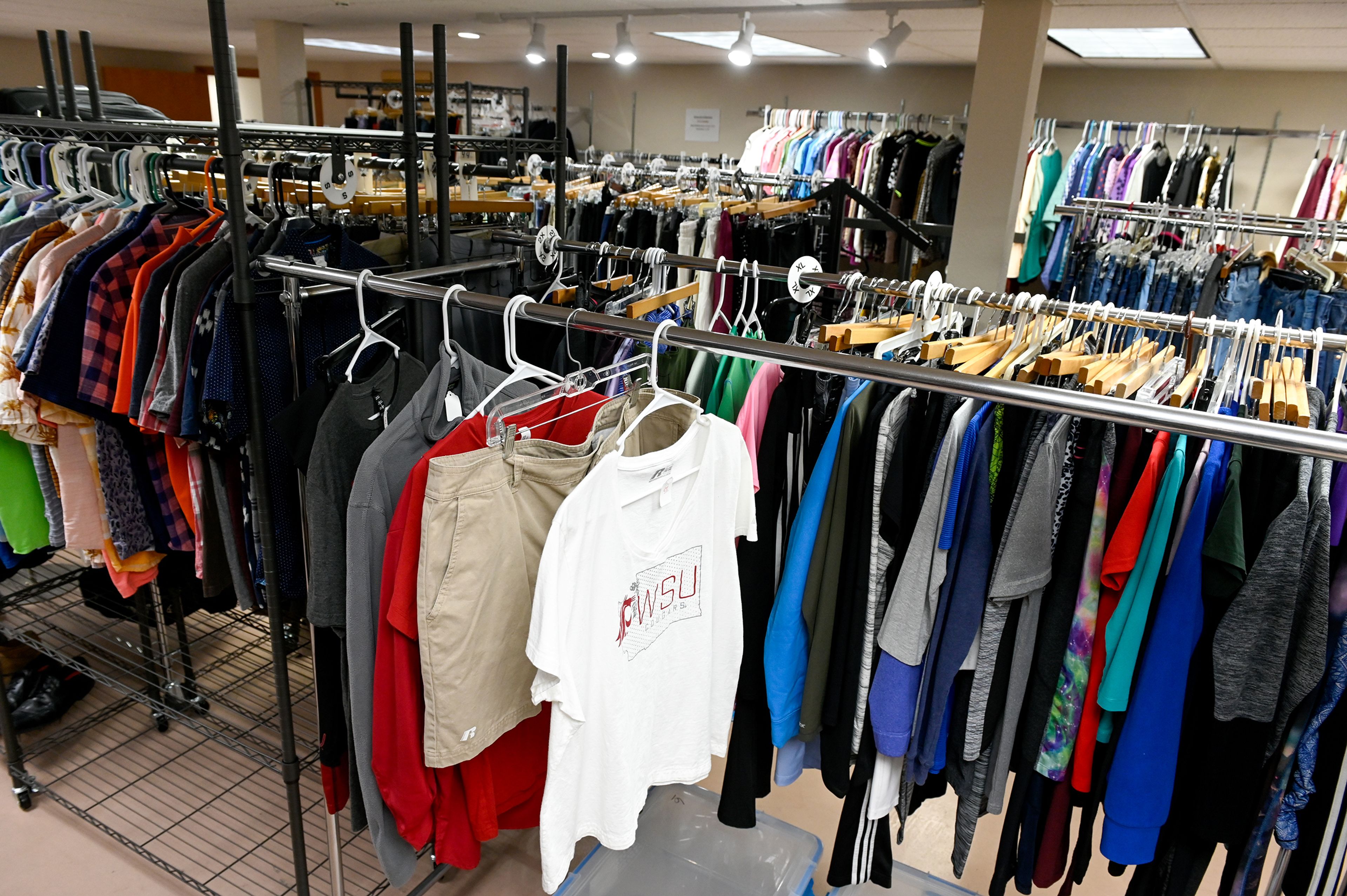 An array of clothing for men and women hang in the main room of Cooper’s Legacy Foundation Resale Shop Wednesday in Pullman.