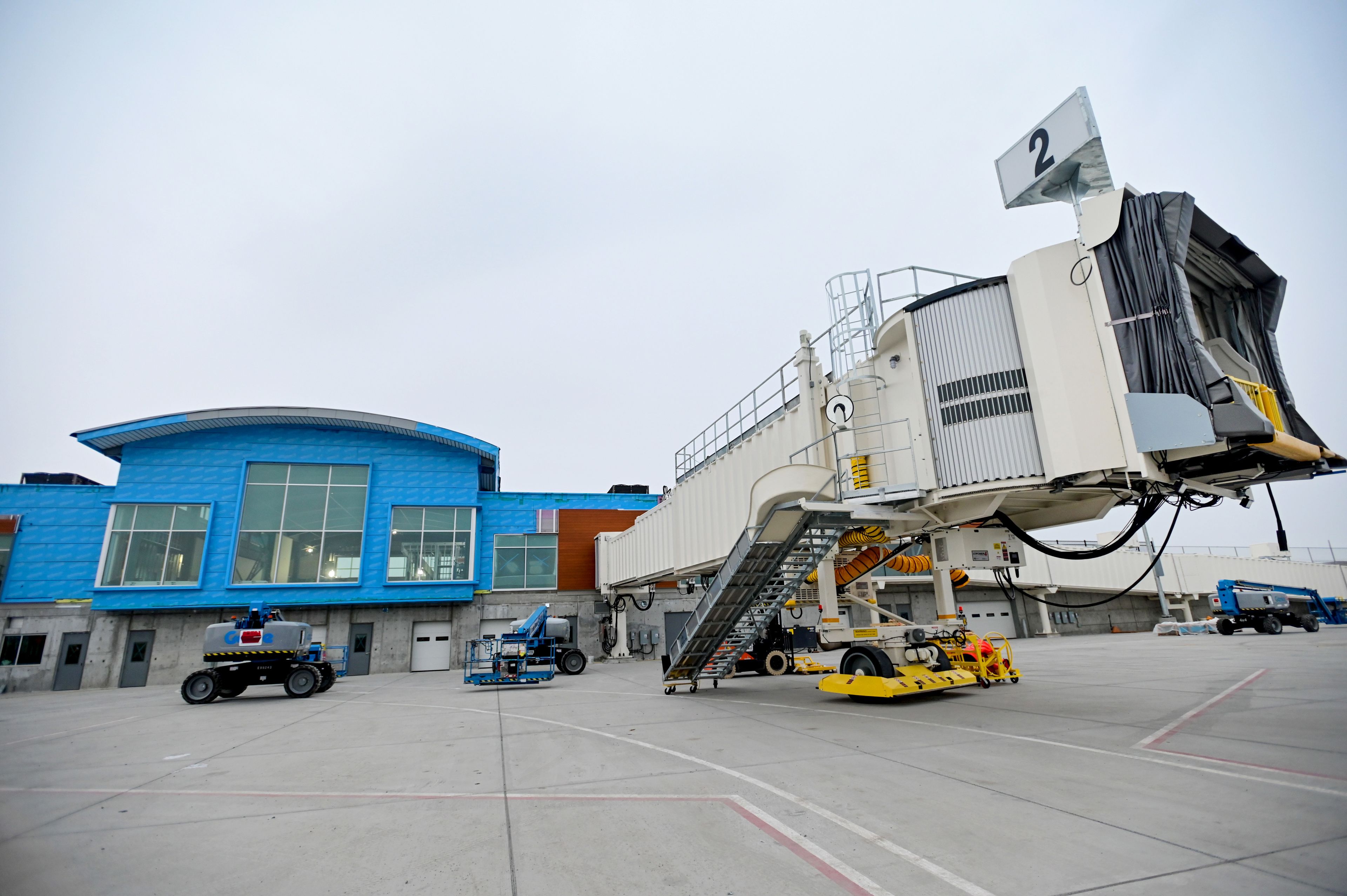 One of two passenger boarding bridges sits attached to the runway side of the new terminal for the Pullman-Moscow Regional Airport on Thursday.