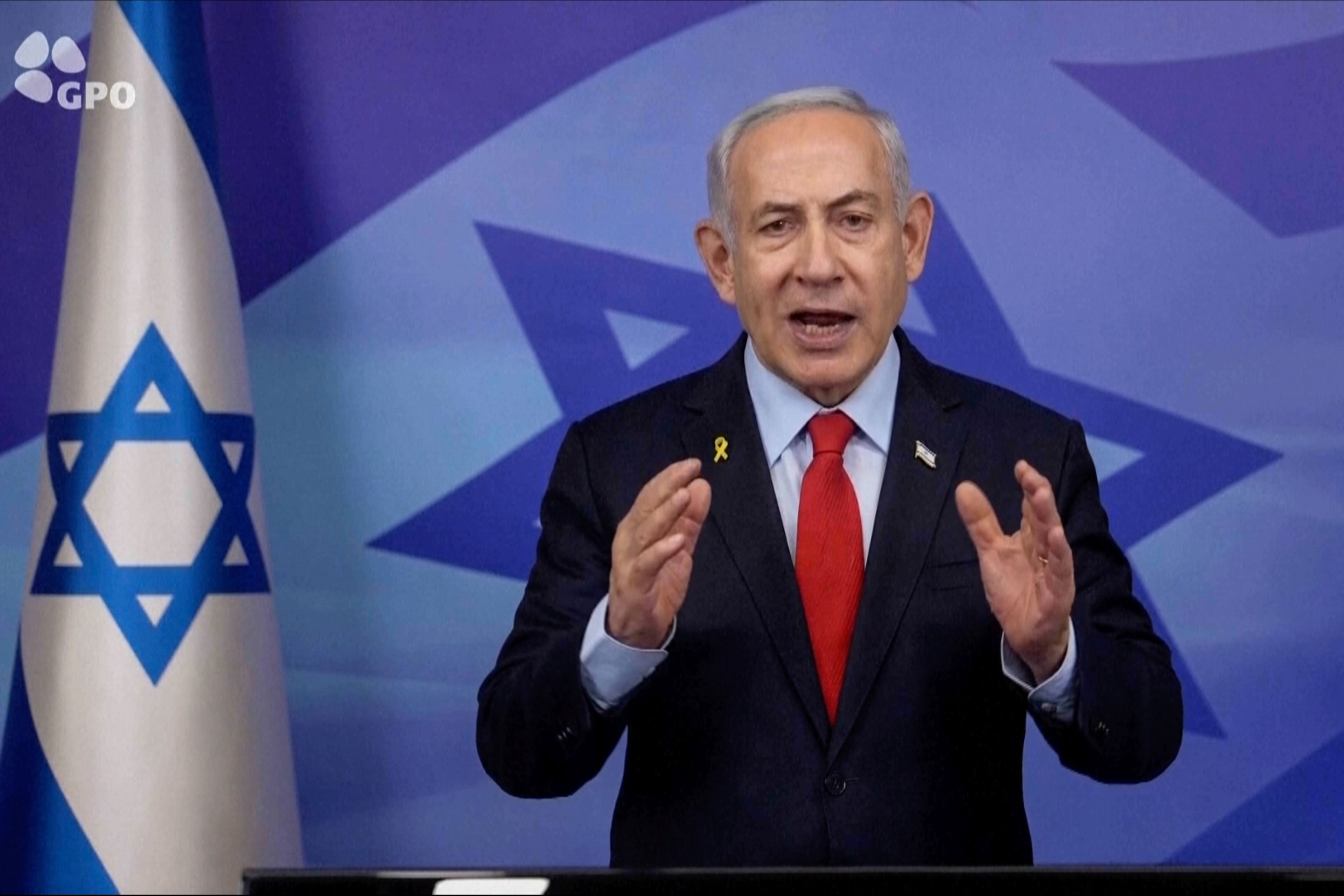 In this screen grab image from video provide by the Israeli Government Press Office, Israeli Prime Minister Benjamin Netanyahu makes a televised statement Tuesday, Nov. 26, 2024, in Jerusalem, Israel. (Israeli Government Press Office via AP)