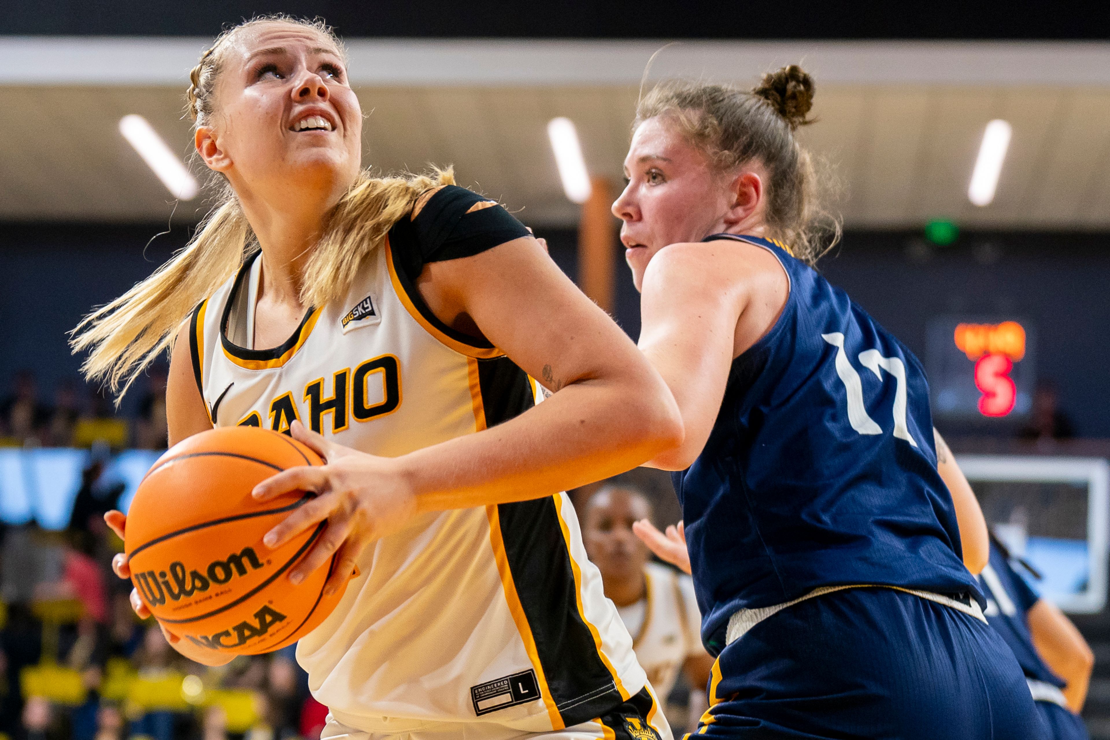 Idaho’s Sarah Brans, left, looks for a shot during a game against Northern Arizona on Feb. 24 at the ICCU Arena in Moscow.