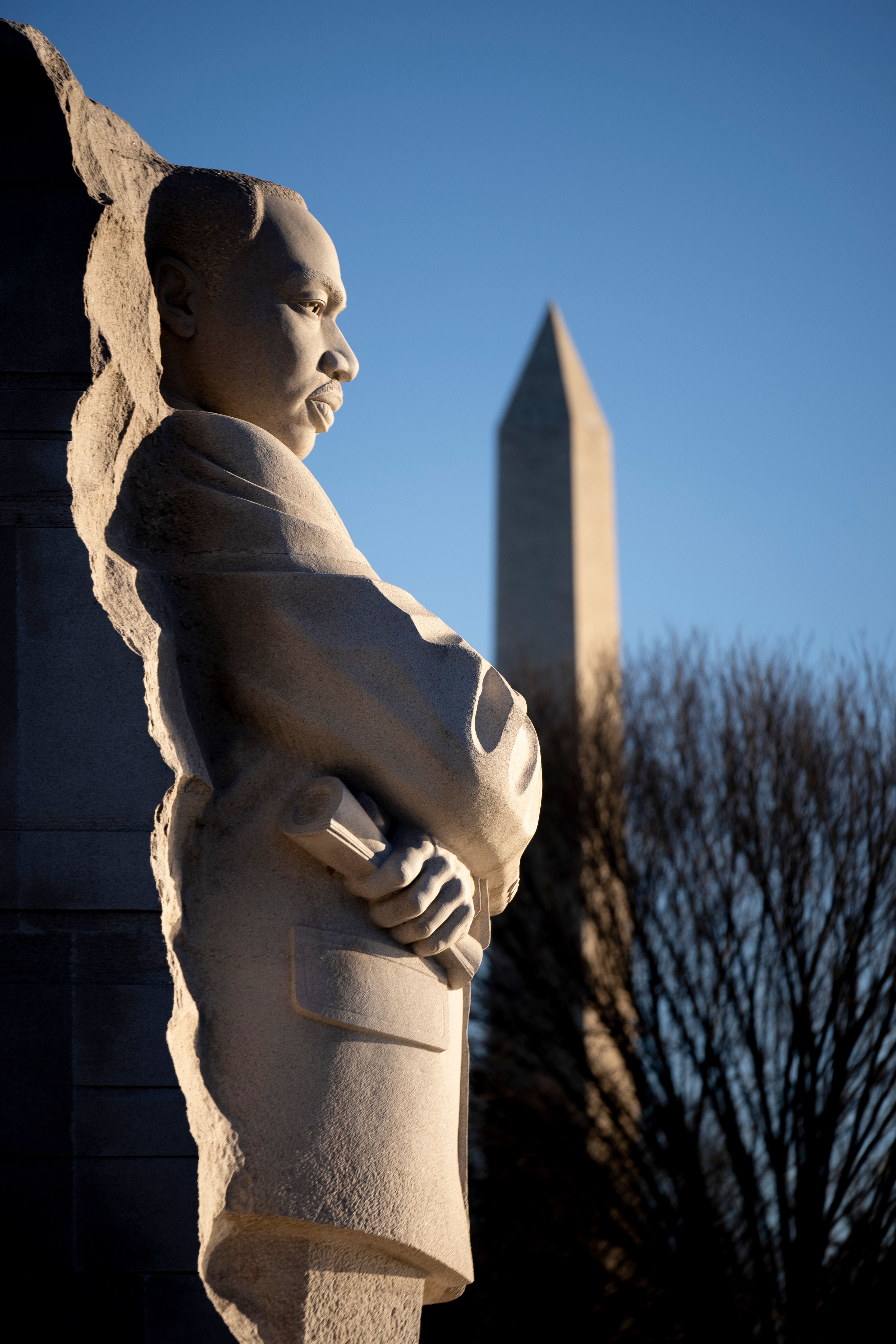 With the Washington Monument in the background, the Martin Luther King, Jr. Memorial is seen on Martin Luther King Jr. Day in Washington, Monday, Jan. 16, 2023. (AP Photo/Andrew Harnik)