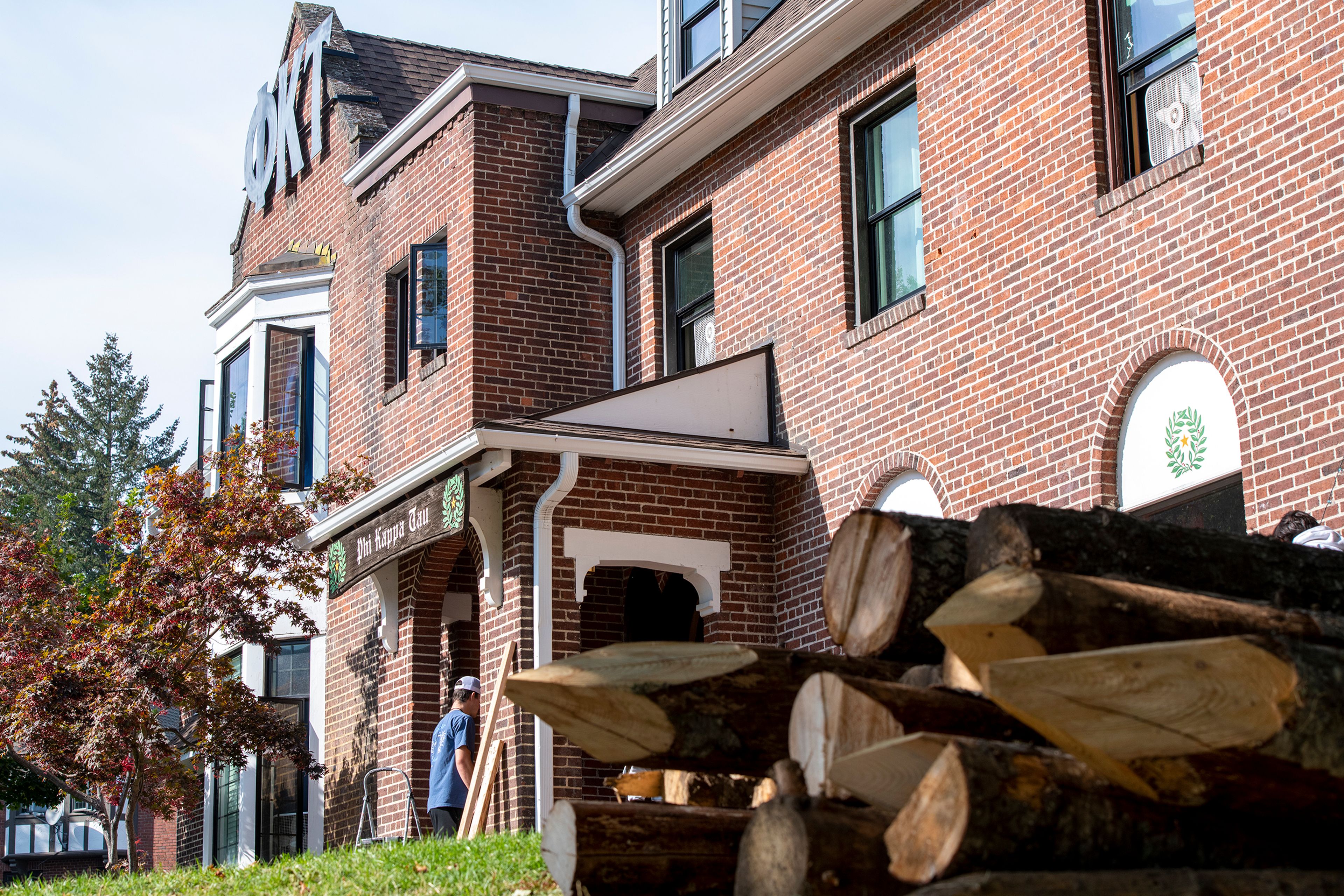 Remnants from Phi Kappa Tau’s “49ers Fort” lie in front of the fraternity house at the University of Idaho in Moscow on Monday. Four people were transported to Gritman Medical Center with injuries Saturday night after the fort collapsed.