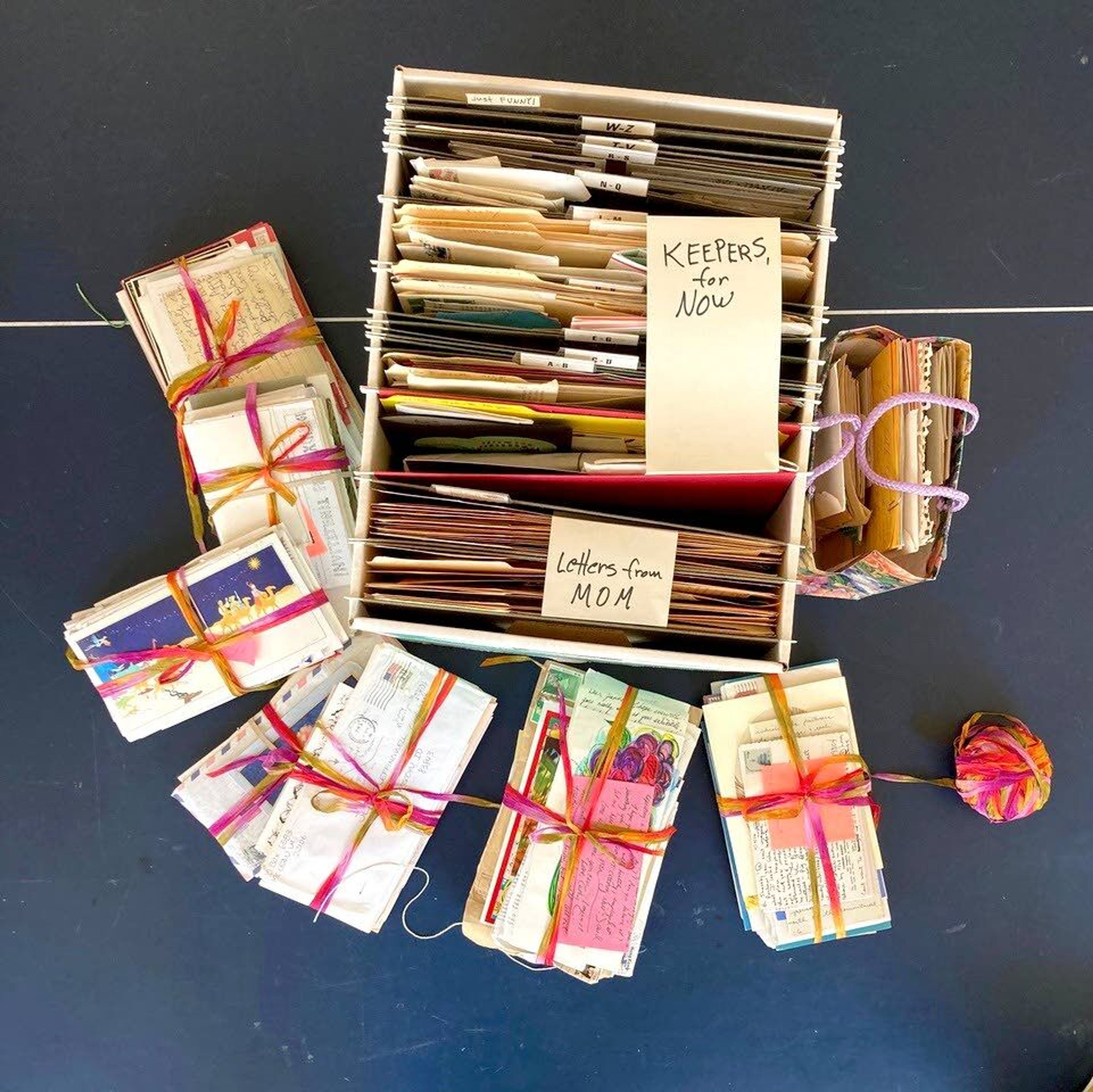 Courtesy Jeanne LeffingwellAfter working several weeks between ping-pong matches with her husband, Jeanne Leffingwell’s mounds of hand-written letters are organized. Some will be mailed to those who originally penned them, while many will be kept for walks down memory lane.