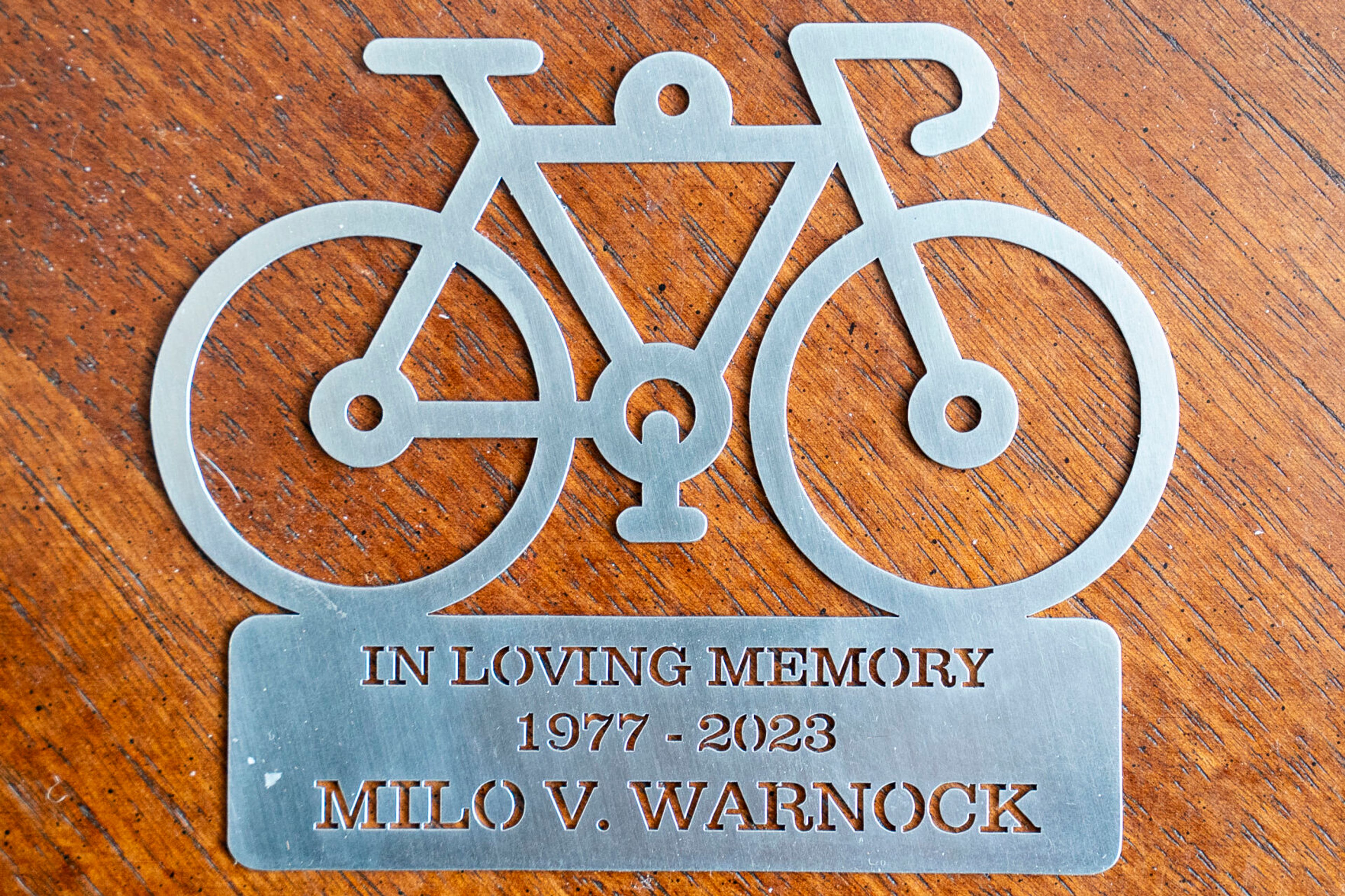 A sheet metal memorial plaque dedicated to Milo Warnock is pictured inside parent’s Kathy and Mike Warnock’s Clarkston home. Milo Warnock was killed in prison after being sentenced to two years for a DUI.