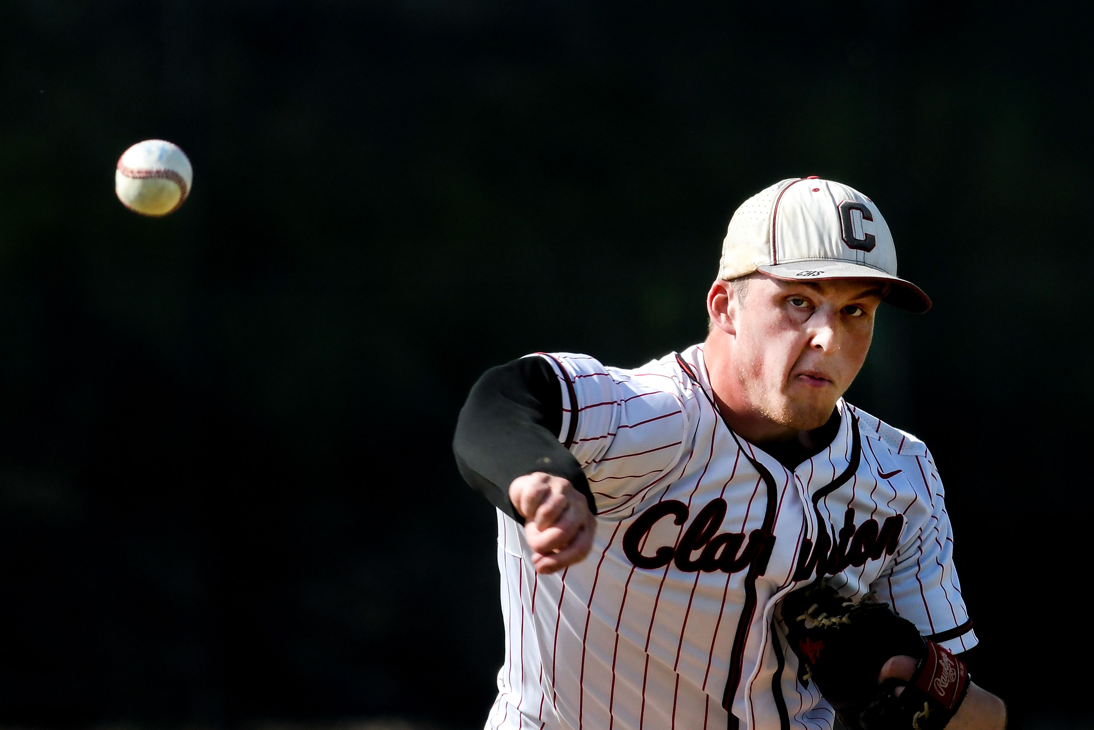 Clarkston pitcher Trace Green throws a pitch against Pullman during a semifinal game of the district tournament Thursday in Pullman.