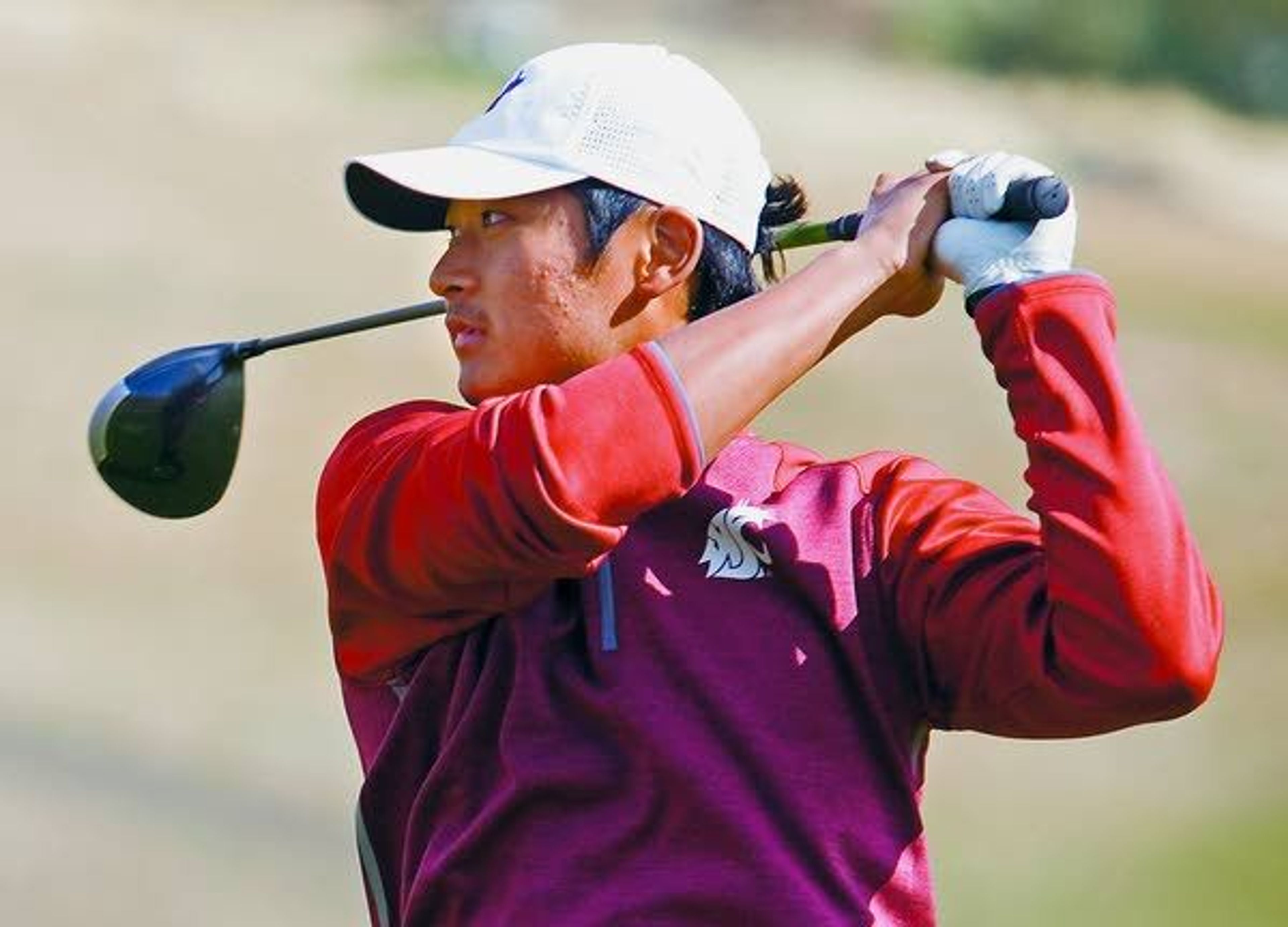 Washington State’s Sang Lee tees off on the ninth hole during Tuesday’s tournament at Palouse Ridge Golf Club in Pullman.