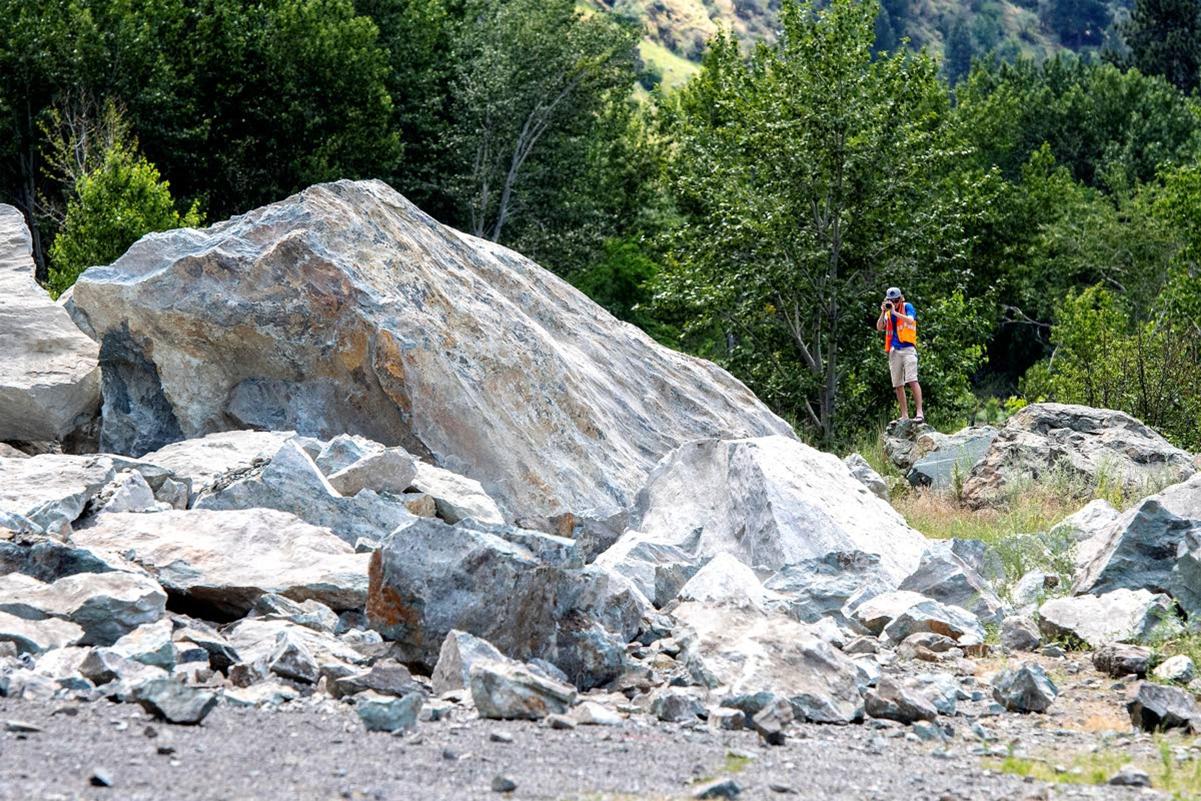 Workers said they would need to break the rocks that slid into smaller rocks before they will be able to move them.August Frank Lewiston Tribune