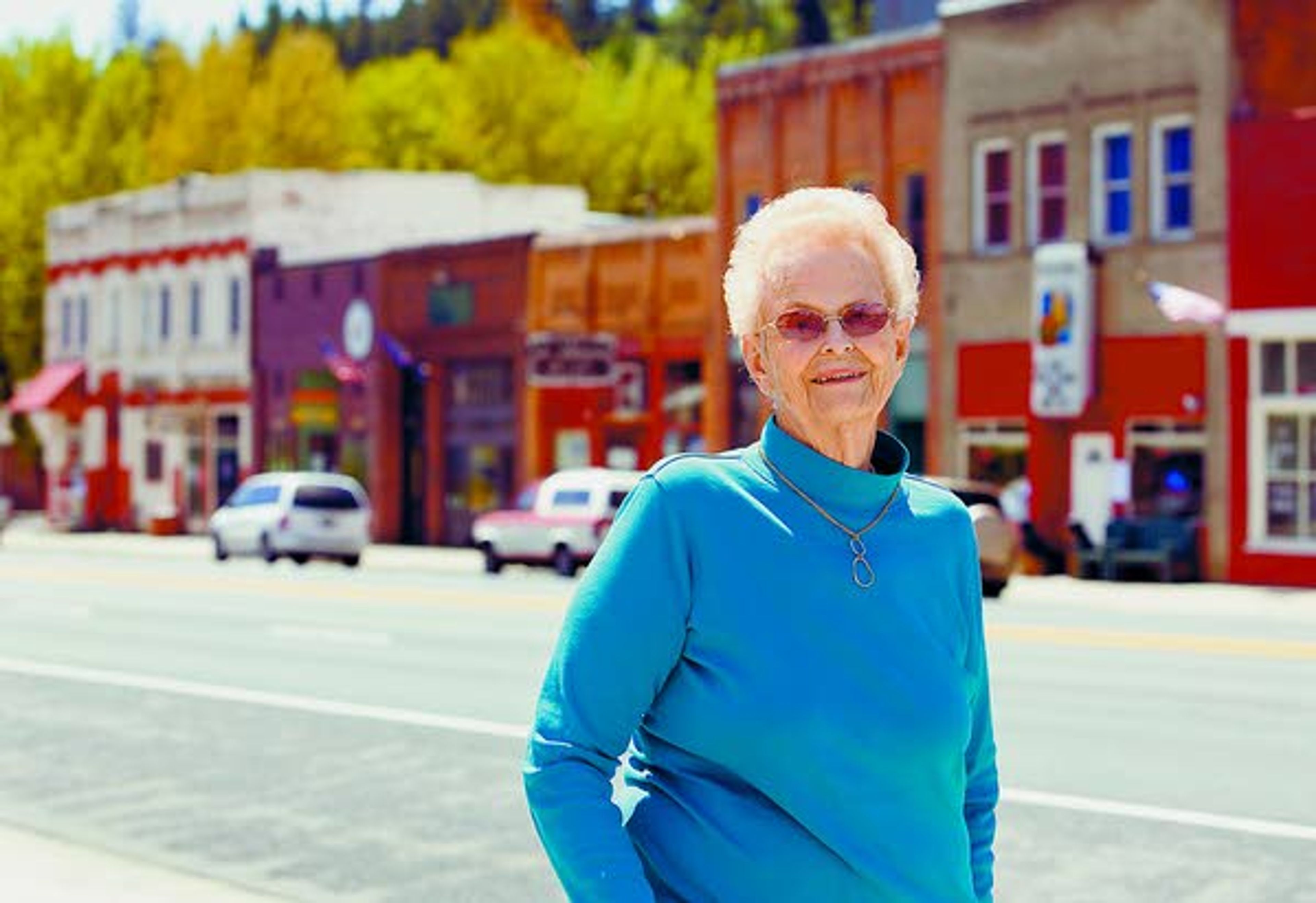 Dorothy Anderson is a founding member of the Troy Historical Society. Anderson is seen Tuesday with some of the historic commercial buildings in downtown Troy.