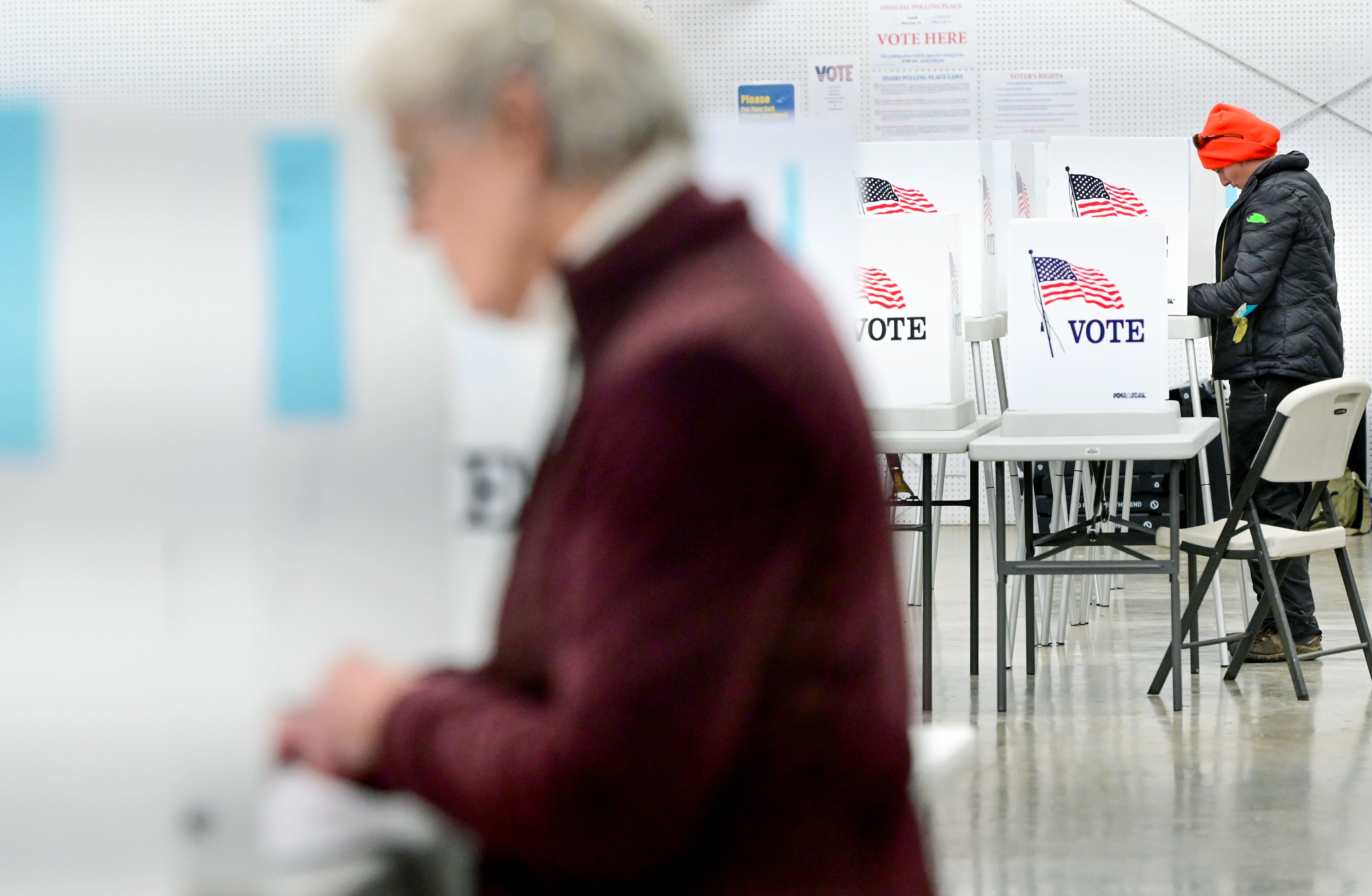 Leora Laurino, right, fills out a ballot at the Latah County Fairgrounds in Moscow on Election Day.