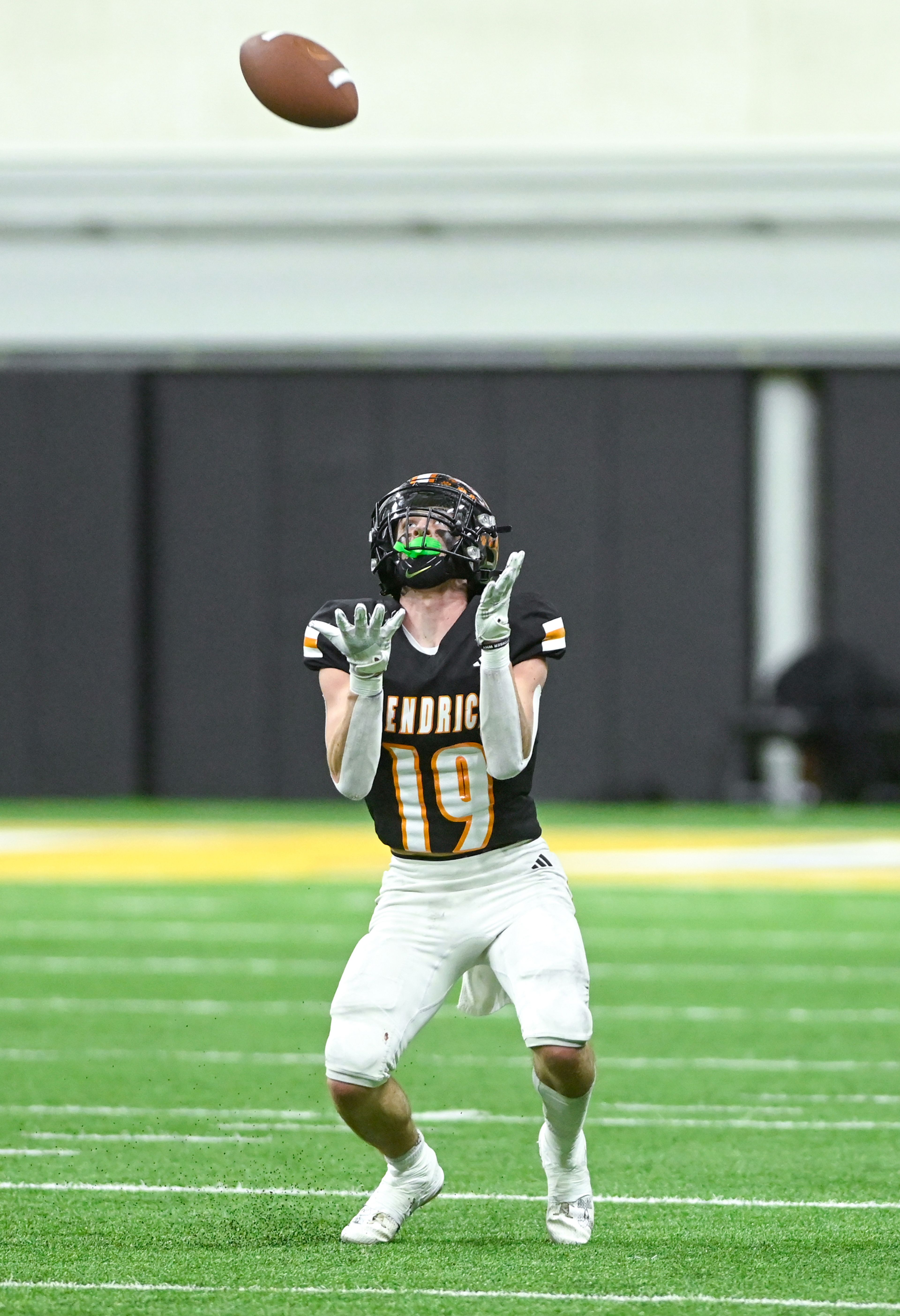 Kendrick’s Sawyer Hewett prepares to catch a kickoff ball from Butte County Friday during the Idaho 2A football state championship game at the P1FCU Kibbie Dome in Moscow.