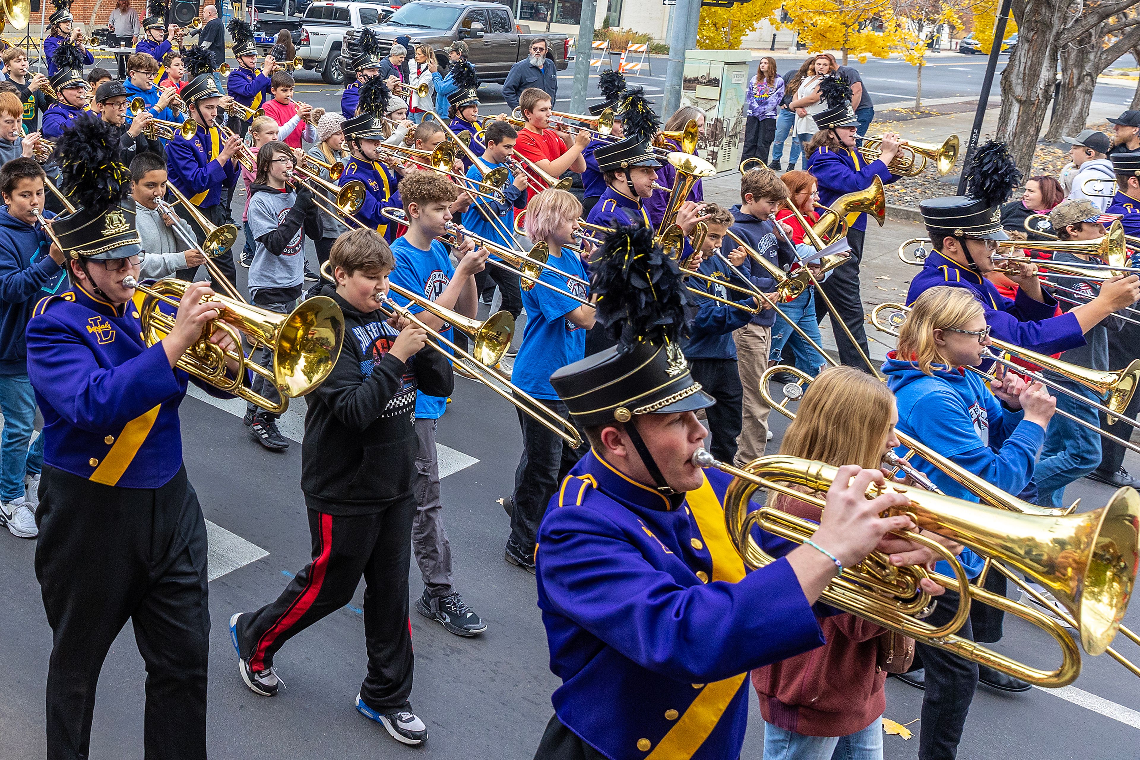 Marching band members play Saturday at the Veteran’s Day Parade on Main Street in Lewiston.