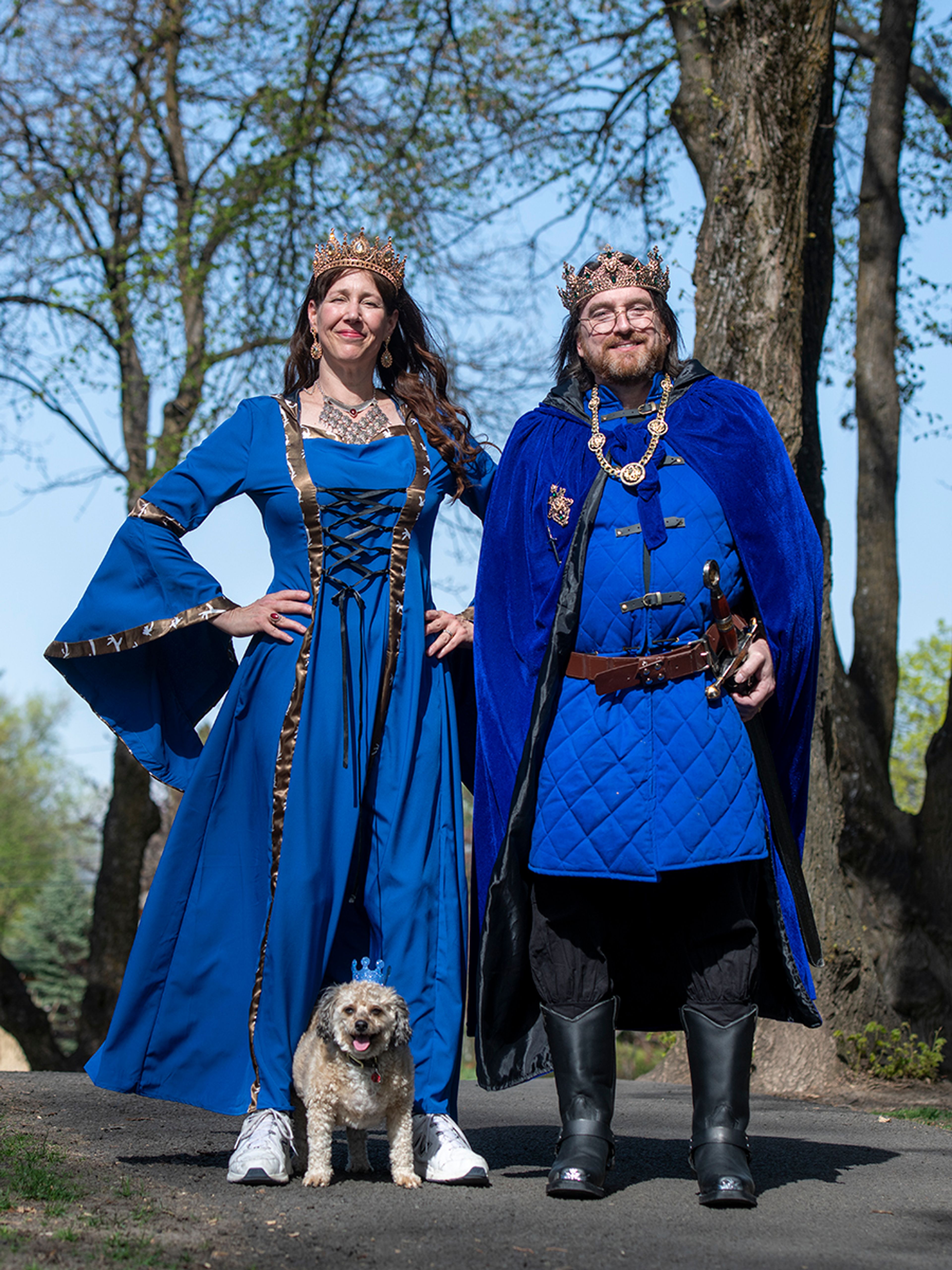 Queen Leeanne Noble and King Tom Preston pose for a portrait with Prince Radar at their side Tuesday at East City Park in Moscow. Noble and Preston were announced as the royal court for renaissance fair’s 50th anniversary.