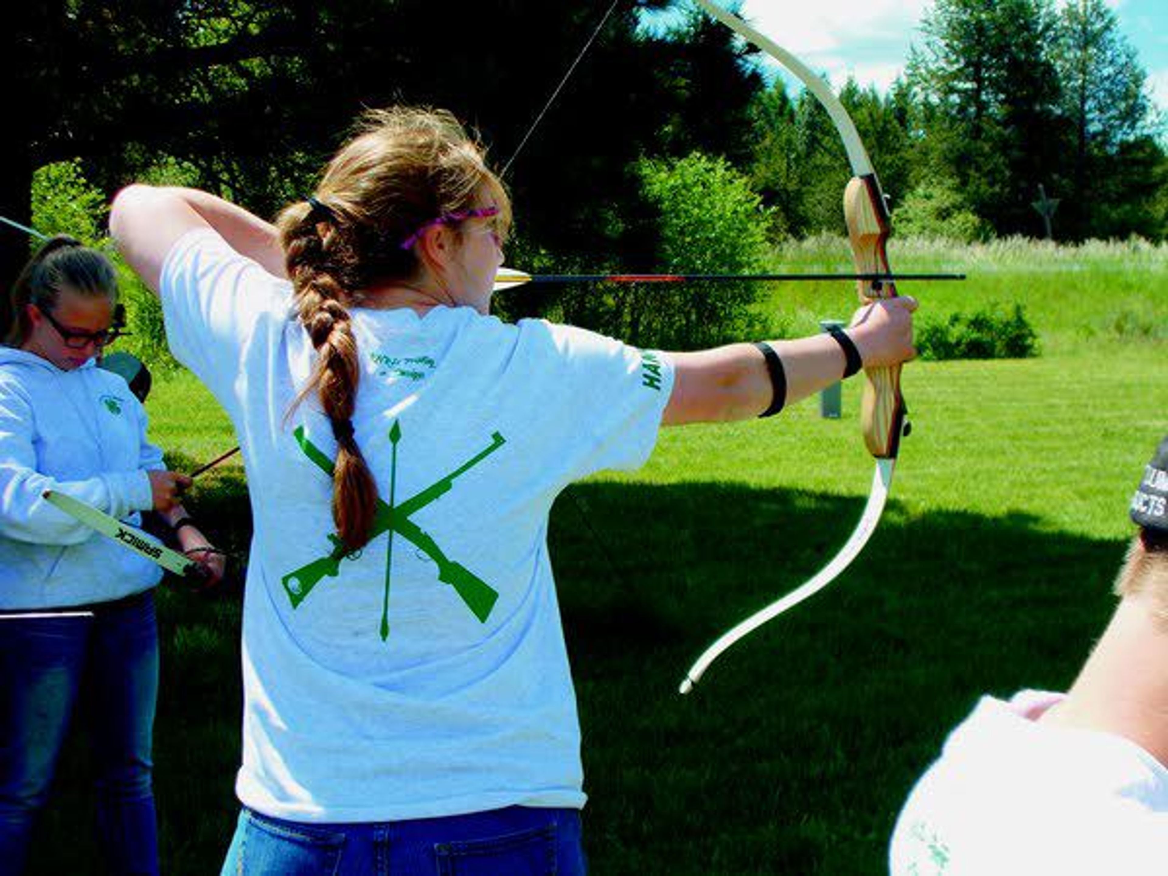 Hannah Barnes prepares to fire an arrow during a practice for the Latah County 4-H shooting sports program Sunday at the Troy-Deary Gun Club.