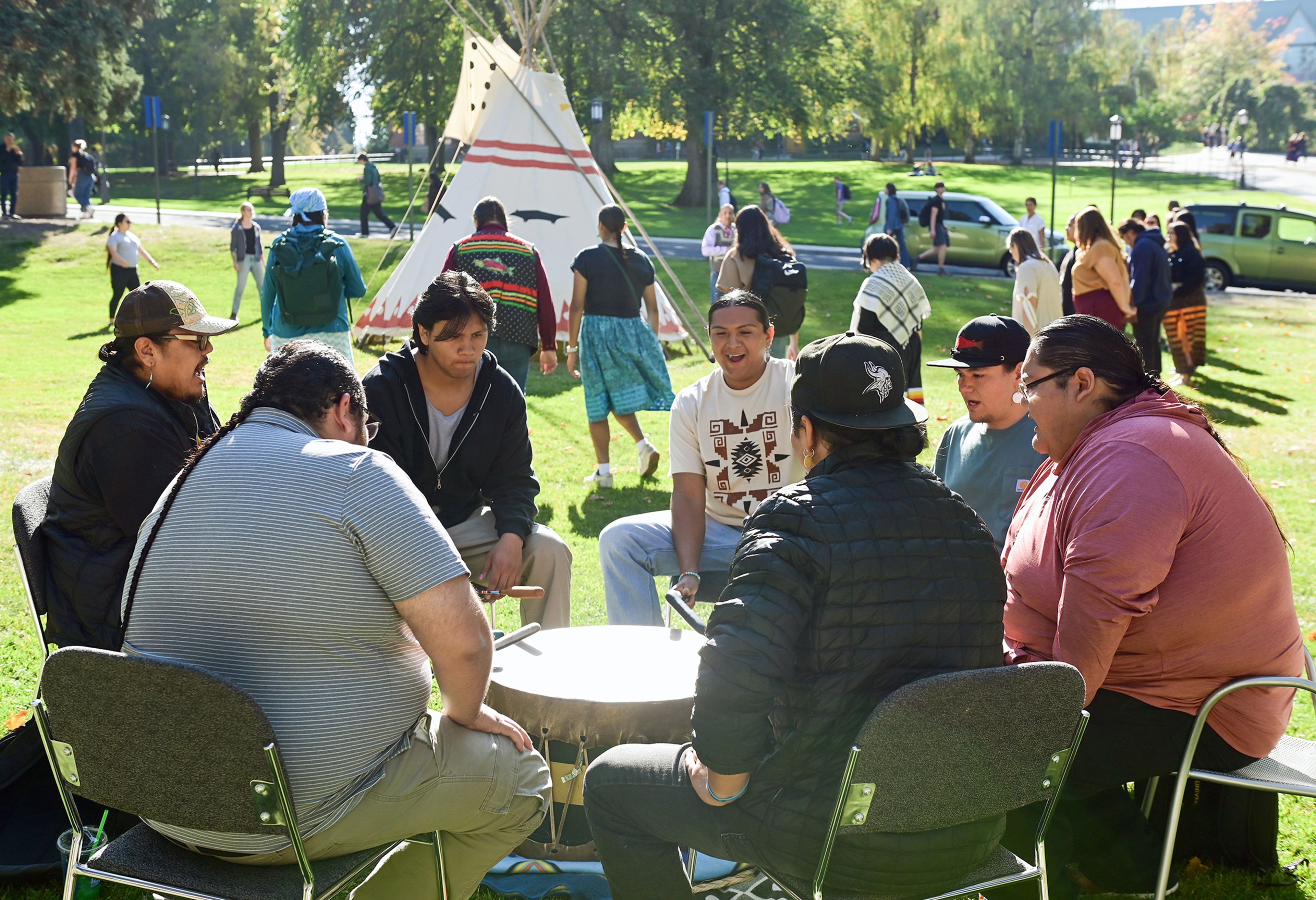 The Vandal Nation Drum Group performs songs for round dances Monday. The crew, which includes Moots Keo, from left, Lance Dick Jr., Dom McGee, Dayln Thomas, Kayden Williamson, Christian Serrano and Jonathan West, played traditional pieces during the Indigenous Peoples Day event hosted by the University of Idaho Native American Student Center on campus in Moscow.